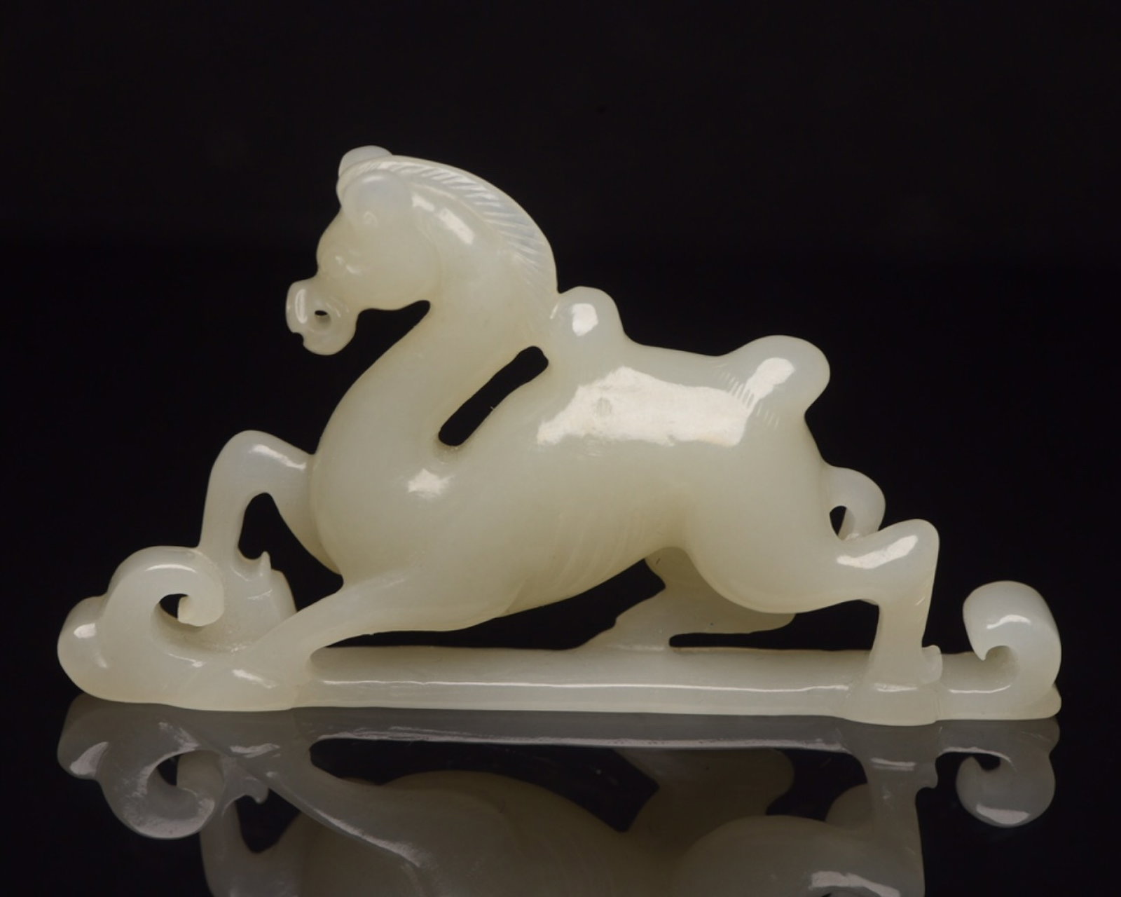 An Exquisite White Jade Camel Ornament: An Exquisite White Jade Camel Ornament,Qing Dynasty,China,Size:3.2inx1.8inx0.5in,Weight:45g 白玉骆驼摆件,中国清代