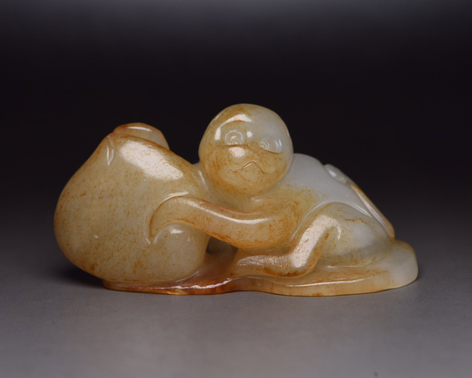 An Exquisite White Jade Monkey Ornament: An Exquisite White Jade Monkey Ornament,Qing Dynasty,China,Size:2.8inx1.4inx1.2in,Weight:60g 白玉猴子摆件,中国清代