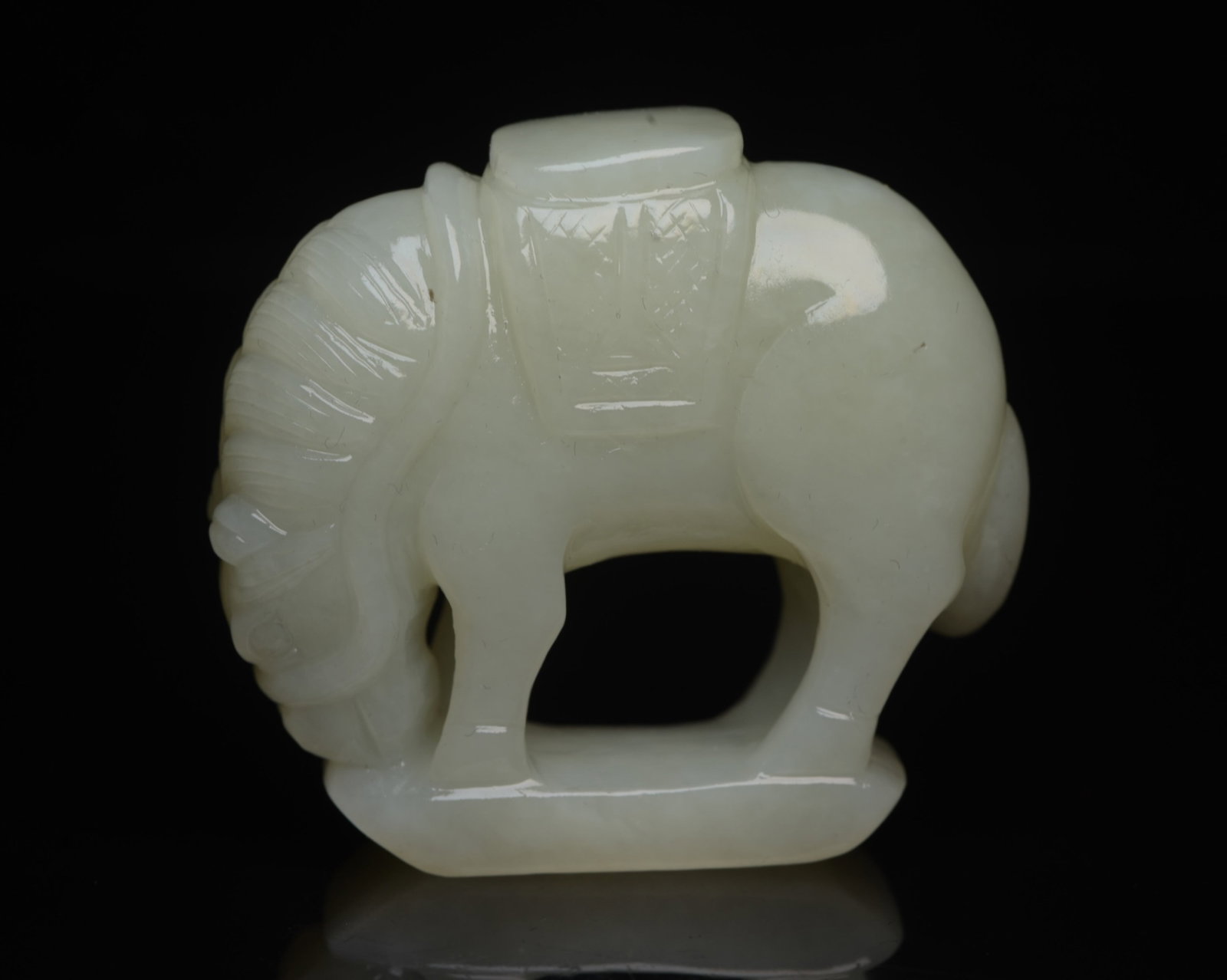 An Exquisite White Jade Horse Ornament: An Exquisite White Jade Horse Ornament,Qing Dynasty,China,Size:2.2inx2inx0.7in,Weight:86g 白玉骏马摆件,中国清代