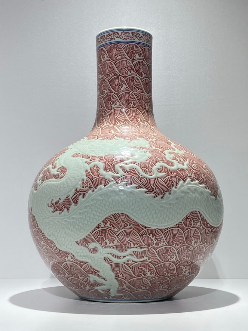 A Huge Underglaze-Red Seawater and Dragon Pattern Vase: A Huge Underglaze-Red Seawater and Dragon Pattern Vase,Qing Dynasty,China,Yongzheng Six-character Mark,Size:17.7inx12.6in 釉里红海水龙纹瓶,中Þ