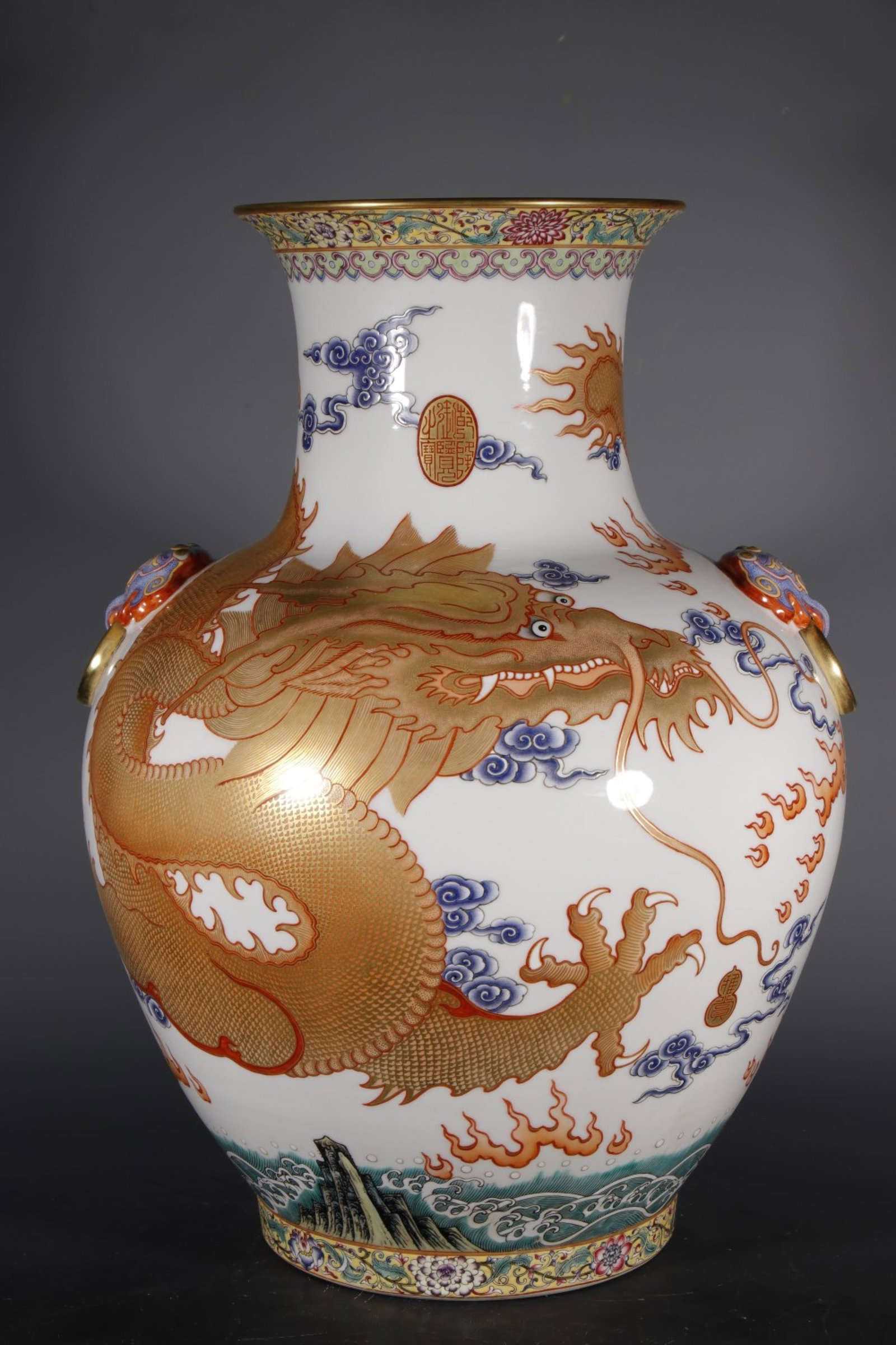 An Exquisite Doucai Painted Gold Auspicious Cloud and Dragon Pattern Beast-Ears Vase: An Exquisite Doucai Painted Gold Auspicious Cloud and Dragon Pattern Beast-Ears Vase,Qing Dynasty,China,Qianlong Four-character Mark,Size:20.1inx8.5in 斗彩描金祥云&