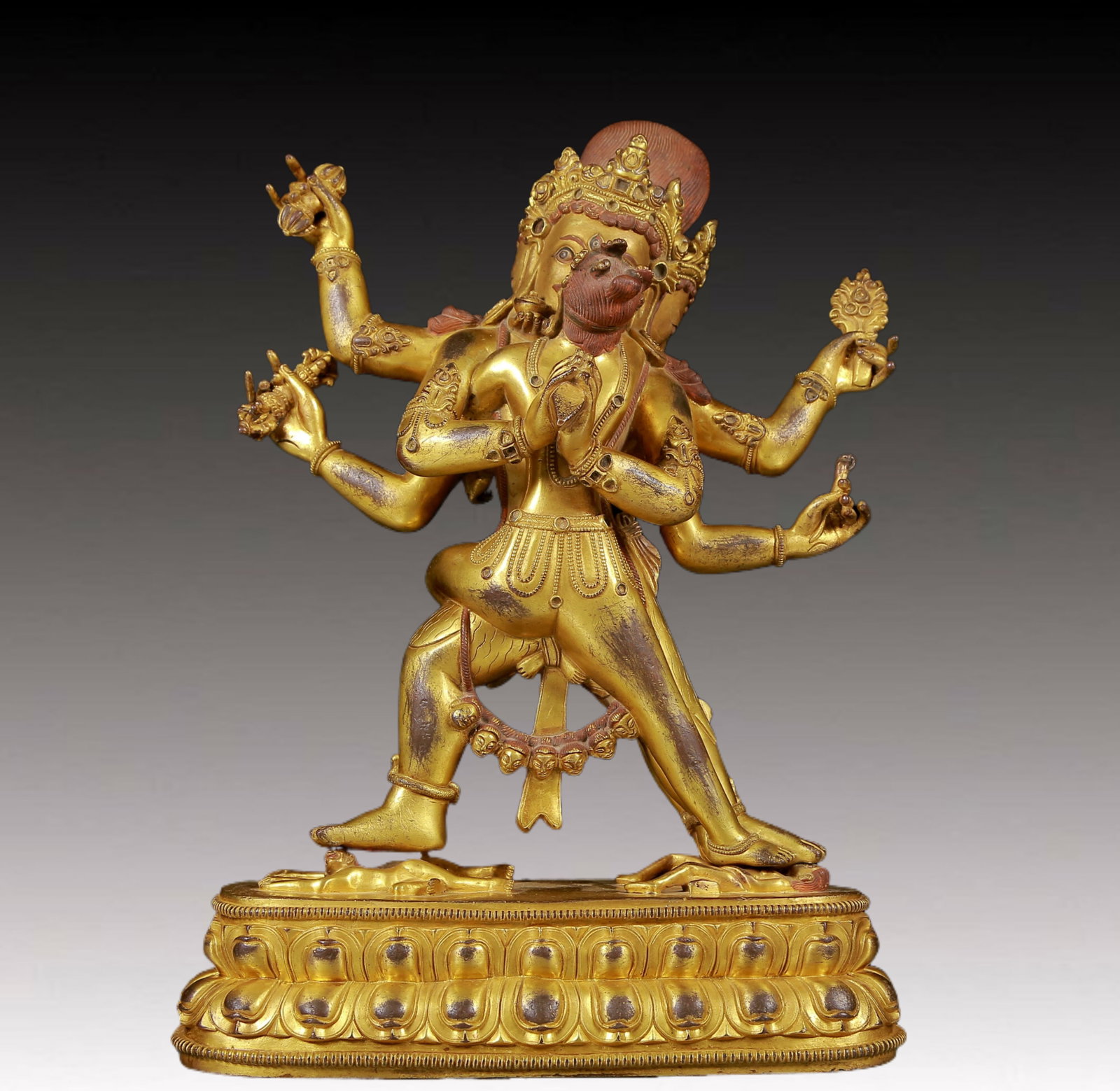 A solemn gilt bronze Vajra statue: solemn gilt-bronze Vajra statue Qing Dynasty, China. The Vajra's figure is solemn and majestic, symbolizing strong will and invincible power. At the same time, his face is solemn, and his brows reveal