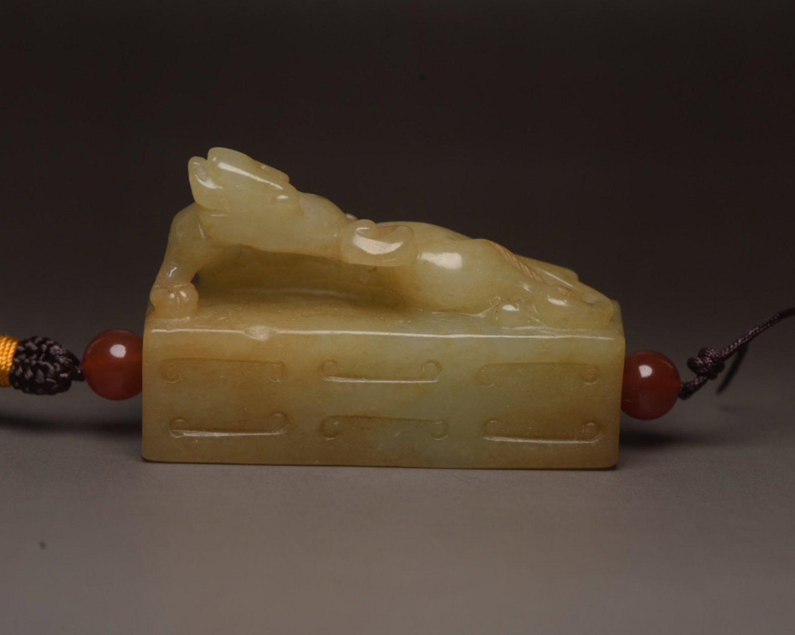An Exquisite White Jade Beast Pendant: An Exquisite White Jade Beast Pendant,Qing Dynasty,China,Size:2.2inx1.4inx0.8in,Weight:68g 白玉兽挂件,中国清代