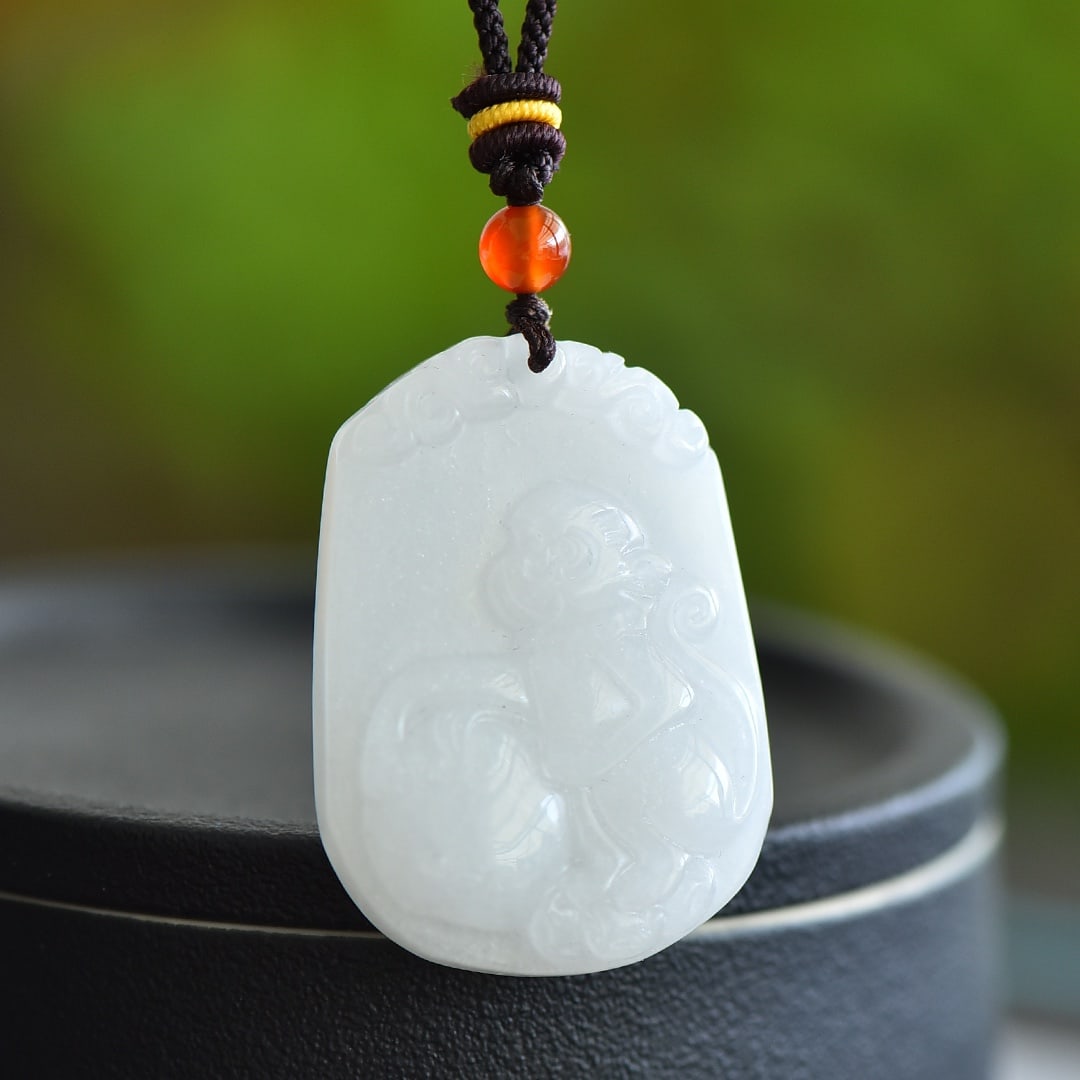 An Exquisite White Jade Monkey Pattern Pendant (1 of 5)