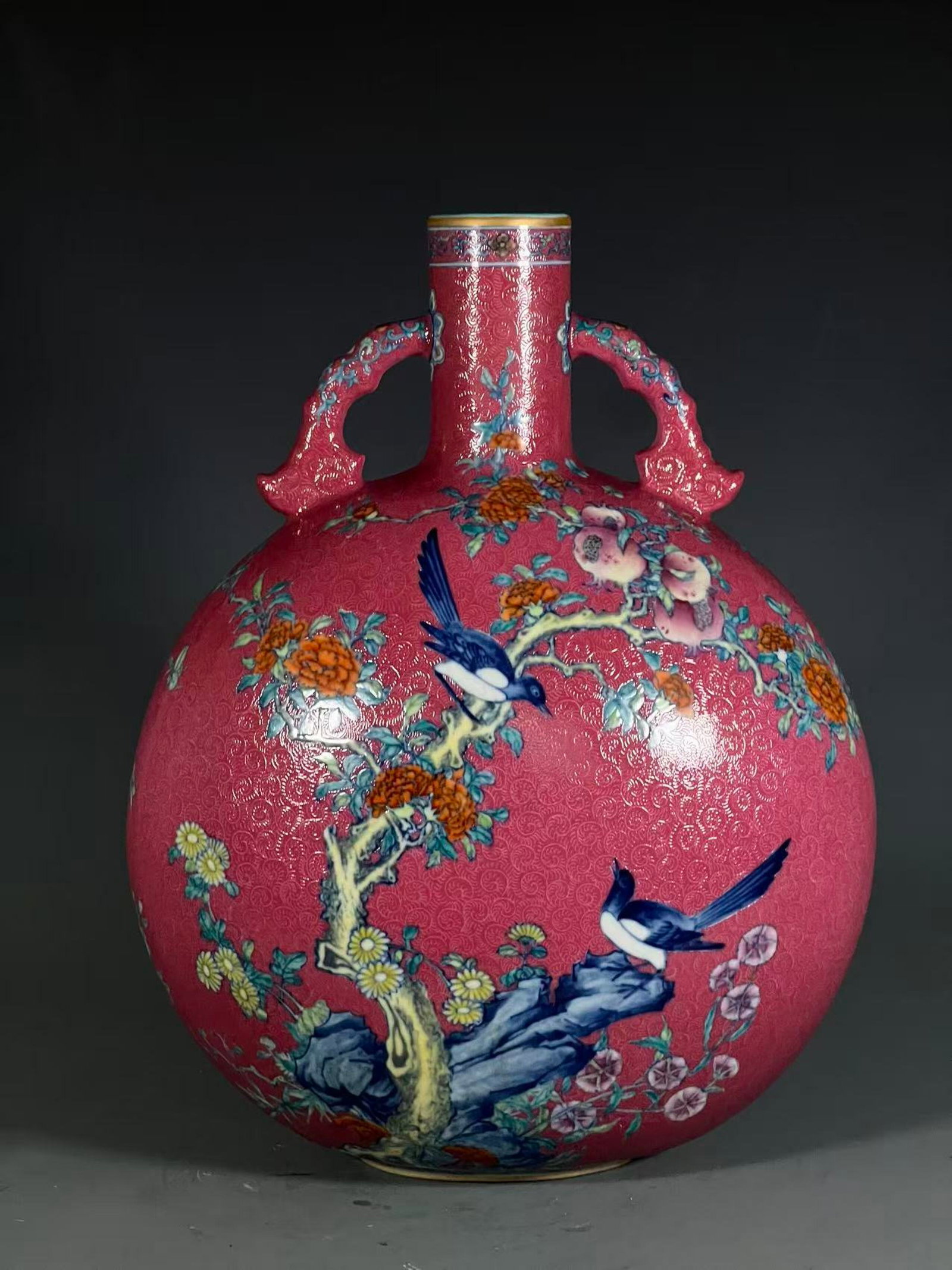 A Rare Ruby Red-Glazed Famille-Rose Flower and Bird Pattern Double-Ears Vase: A Rare Ruby Red-Glazed Famille-Rose Flower and Bird Pattern Double-Ears Vase,Qing Dynasty,China,Yongzheng Six-character Mark,Size:14.8inx4.3in 胭脂红粉彩花鸟&