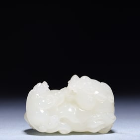 An Exquisite White Jade Auspicious Beast Ornament