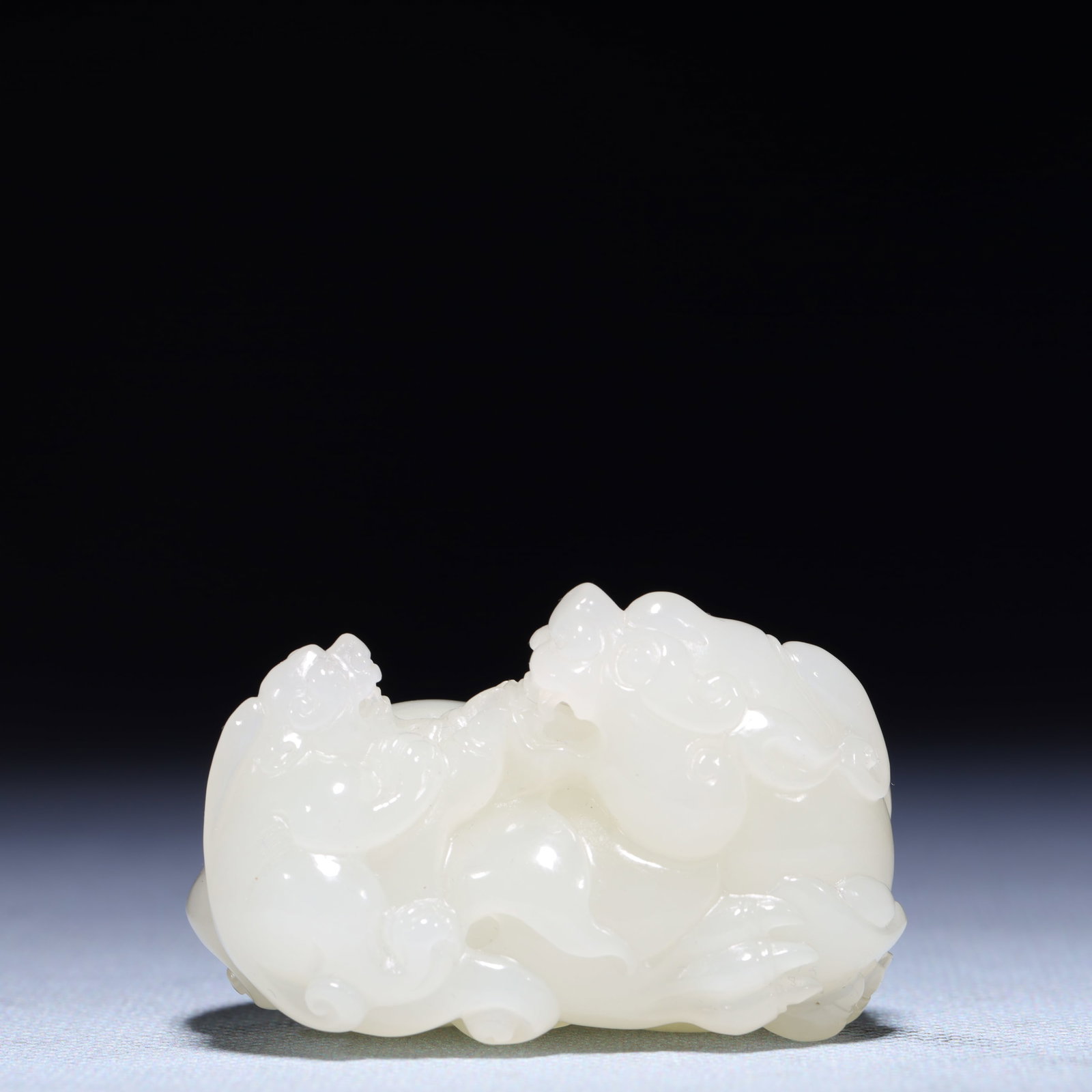 An Exquisite White Jade Auspicious Beast Ornament: An Exquisite White Jade Auspicious Beast Ornament,Qing Dynasty,China,Size:2.4inx1.6inx1.4in,Weight:127.2g 白玉瑞兽摆件,中国清代