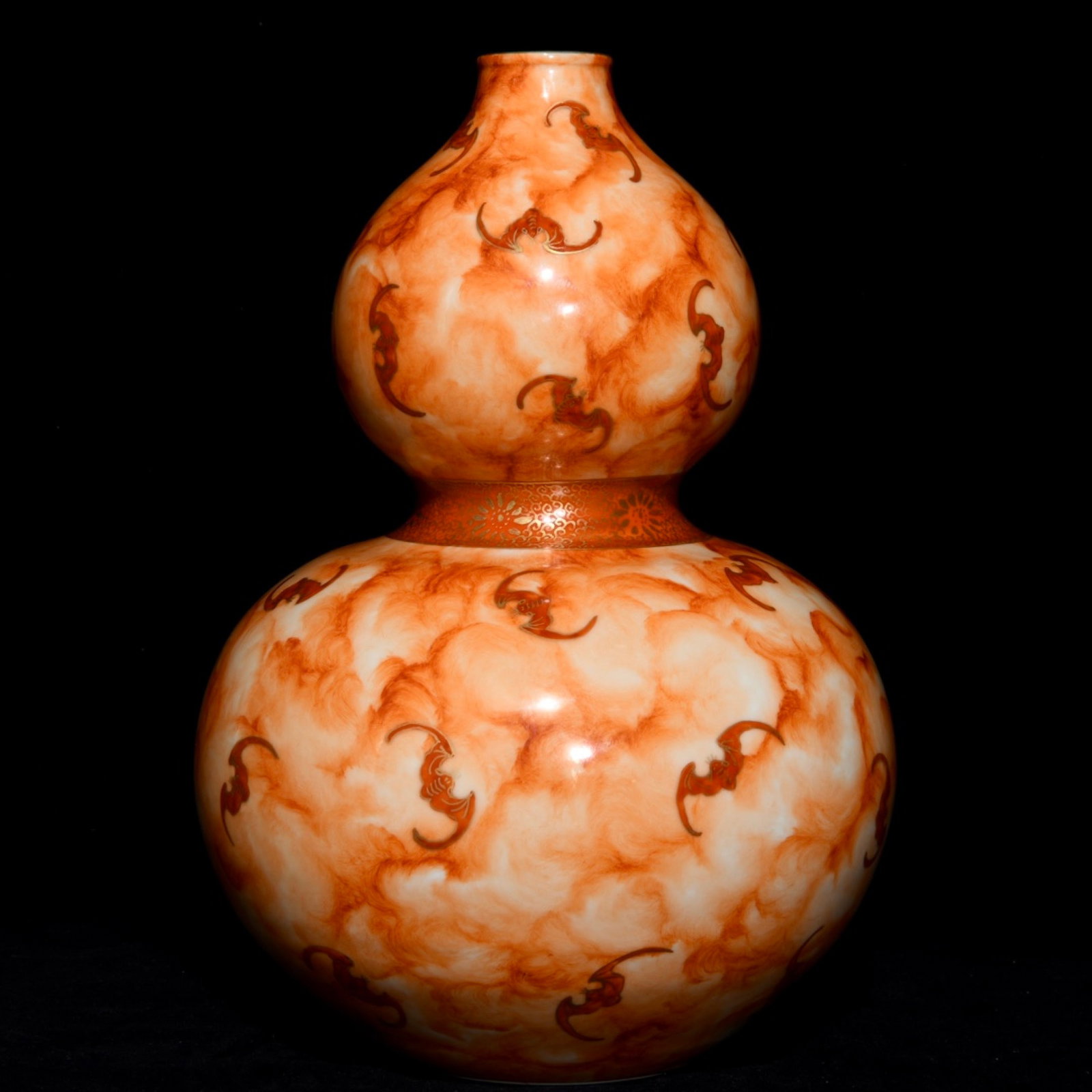 A Rare Iron-Red Painted Gold Bat Pattern Gourd-Shaped Vase: A Rare Iron-Red Painted Gold Bat Pattern Gourd-Shaped Vase,Qing Dynasty,China,Qianlong Six-character Mark,Size:12.5inx8.7in 矾红描金蝙蝠纹葫芦