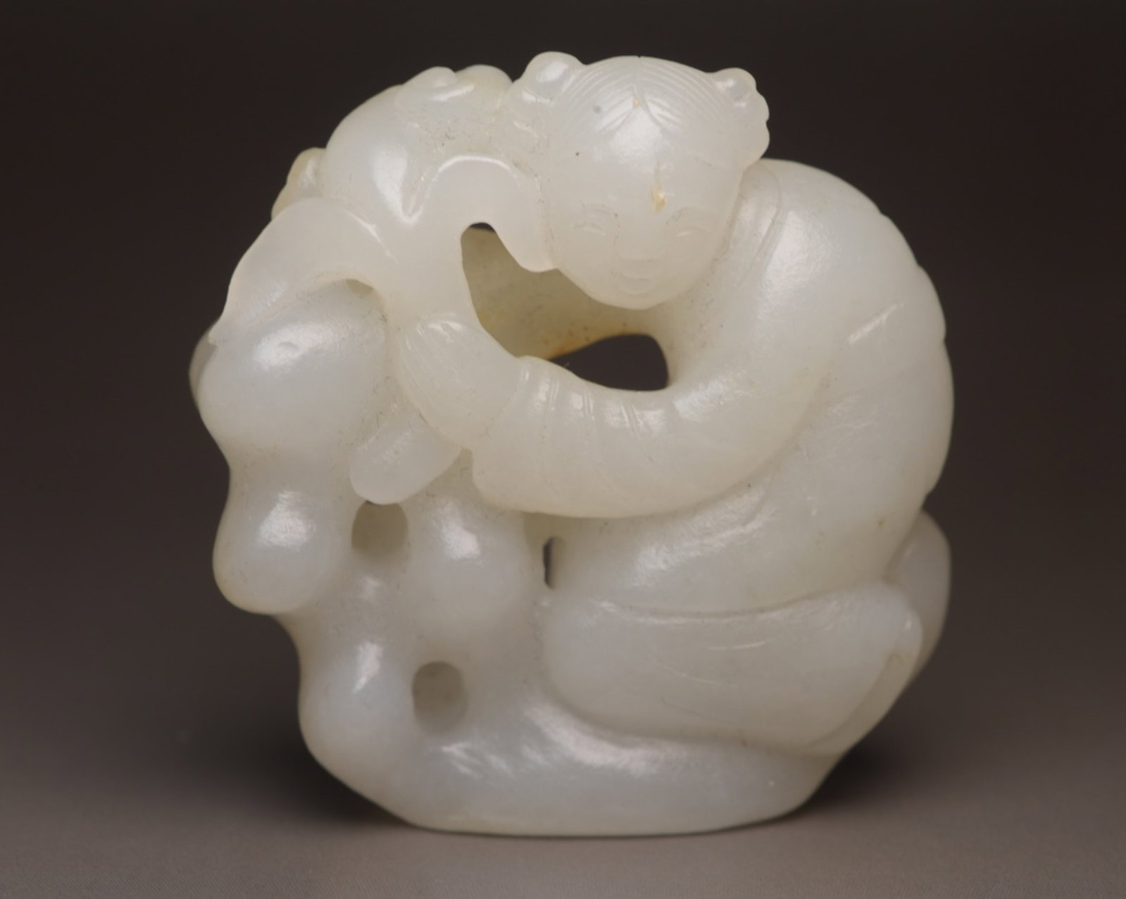 An Exquisite White Jade Figure Ornament: An Exquisite White Jade Figure Ornament,Qing Dynasty,China,Size:2.1inx2.1inx0.6in,Weight:72g 白玉人物摆件,中国清代
