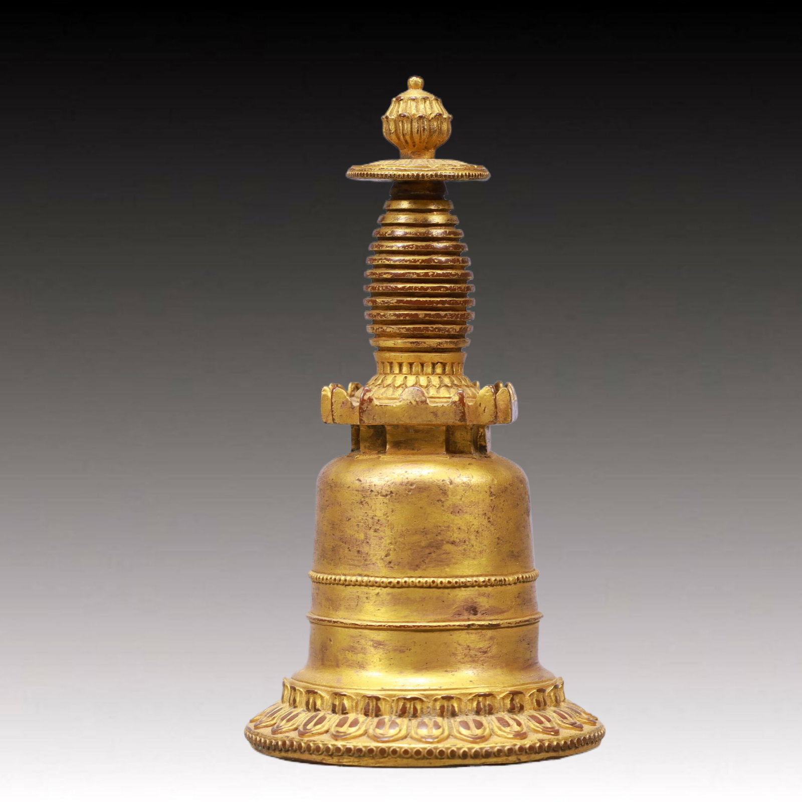 An Exquisite Gilt Bronze Pagoda: An Ecmxquisite Gilt Bronze Pagoda ,Qing Dynasty, China,Size:6.1inx3.1inWeight:550g 铜鎏金佛塔,中国清代