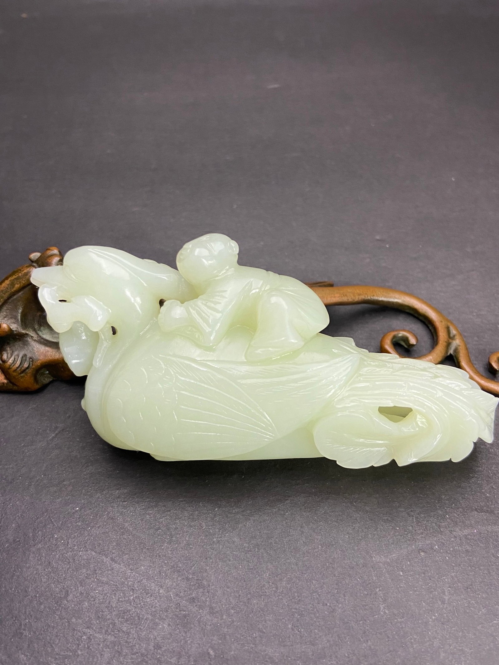 An Exquisite White Jade Figure Pattern Phoenix Hand Piece: An Exquisite White Jade Figure Pattern Phoenix Hand Piece,Qing Dynasty,China,Size:2.3inx2inx1.2in,Weight:171g 白玉人物纹凤凰手把件,中&