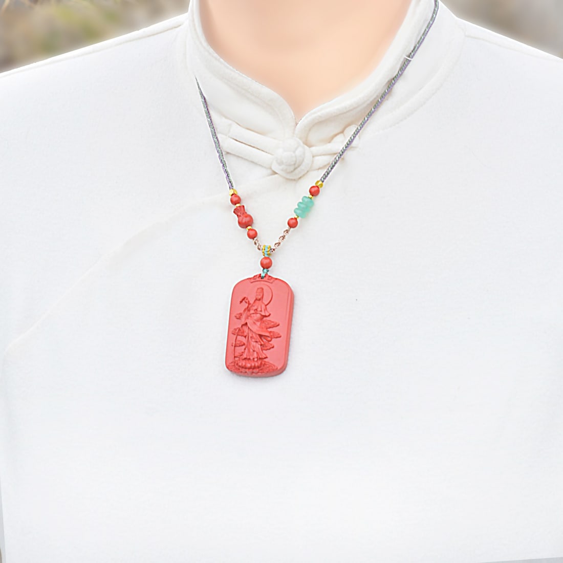 An Exquisite Cinnabar Pendant with Statue of Avalokitesvara: An Exquisite Cinnabar Pendant with Statue of Avalokitesvara,Size:1.2inx1.9in,Weight:46.7g 朱砂挂件带观音像