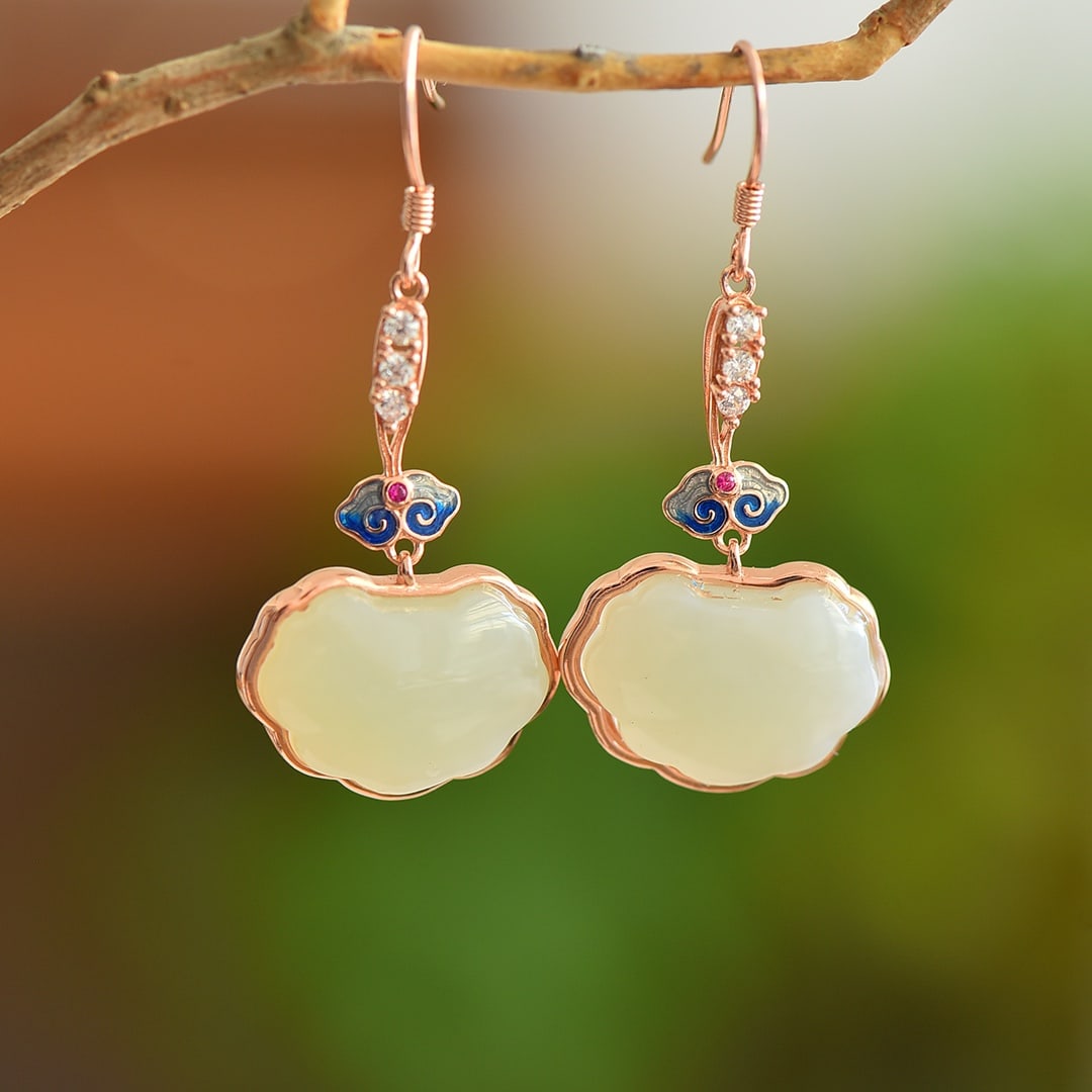 A Pair of Exquisite Sterling Silver-Gold Plated Inlaid White Jade Earrings: A Pair of Exquisite Sterling Silver-Gold Plated Inlaid White Jade Earrings, 一对纯银镀金镶白玉耳环