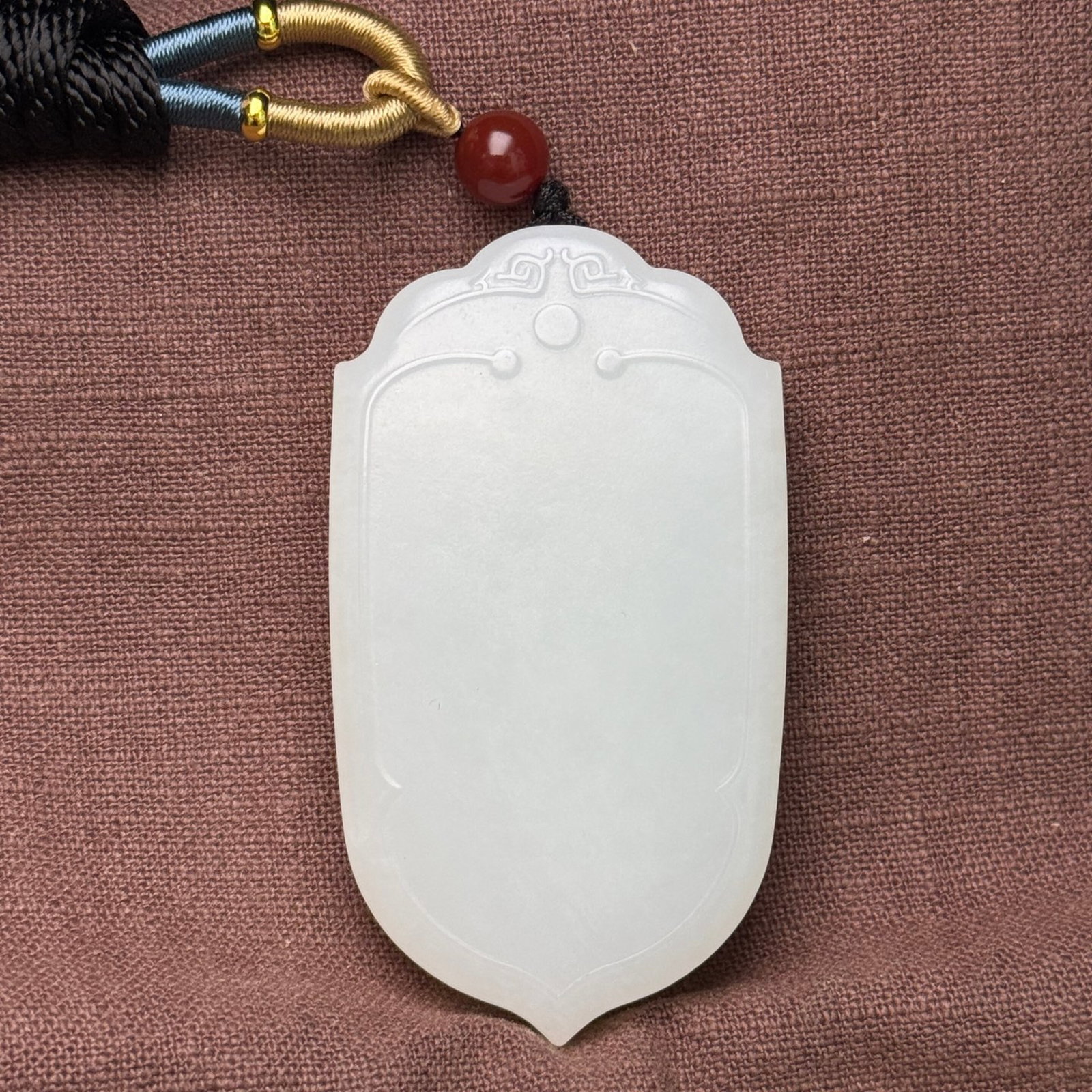 An Exquisite White Jade Pendant: An Exquisite White Jade Pendant,Qing Dynasty,China,Size:1.5inx2.7inx0.4in,Weight:75g 白玉挂件,中国清代