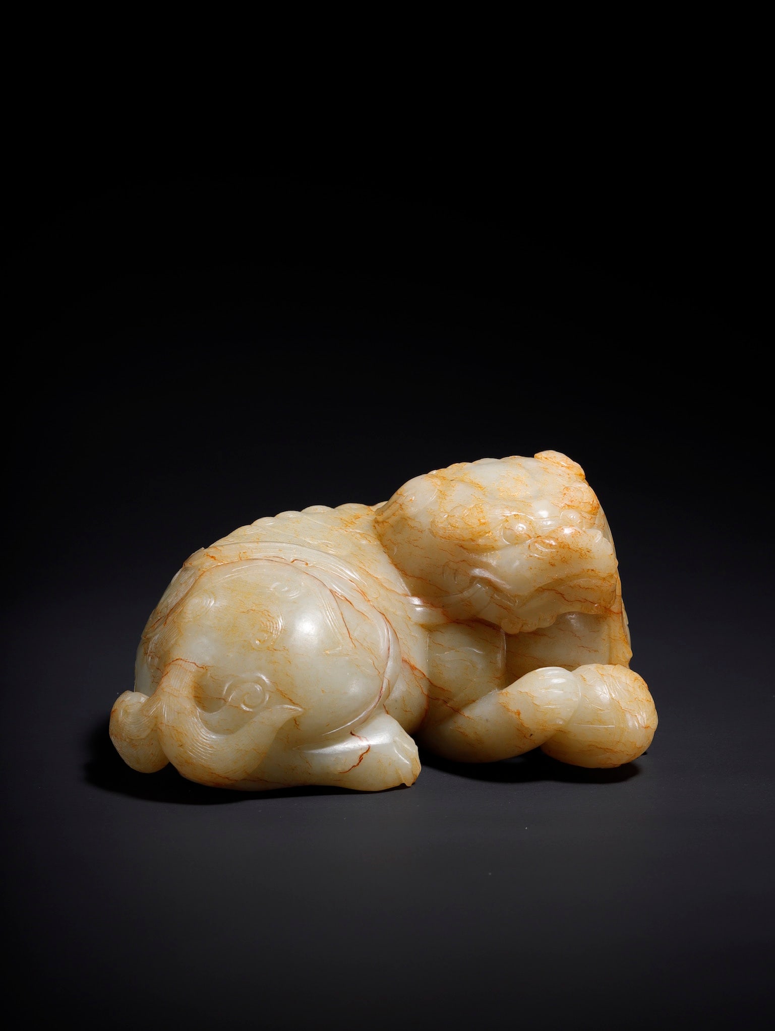 An Exquisite White Jade Lion Ornament (1 of 10)
