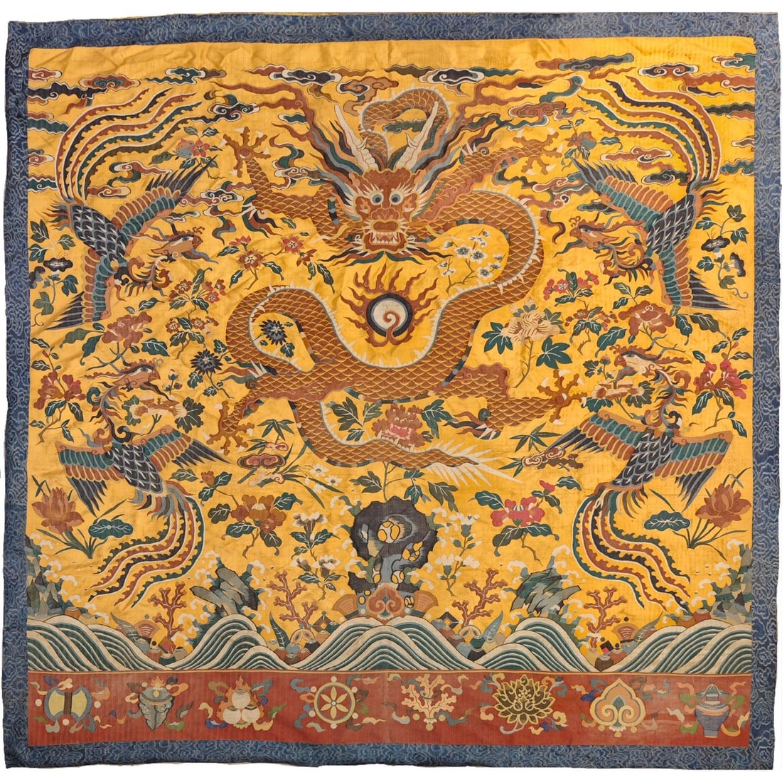 An exquisite dragon and phoenix kesi: An exquisite kesi with a dragon and phoenix pattern, Qing Dynasty, China. The kesi craft is an ancient and fine handicraft with a long history and unique skills in China. This technique is usually use
