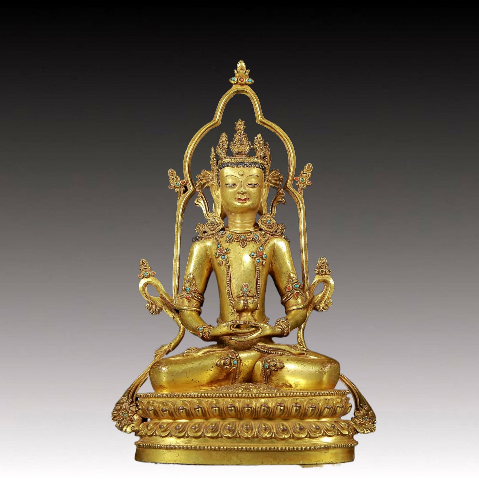 A Brilliant Gilt-Bronze Gem-Inlaid Figure Of Amitayus With marks: A Brilliant Gilt-Bronze Gem-Inlaid Figure Of Amitayus With marks. Seated on a base with a peaceful expression, body adorned with jewelry ornaments, topknot surmounted by a splendid diadem. Chinese Min