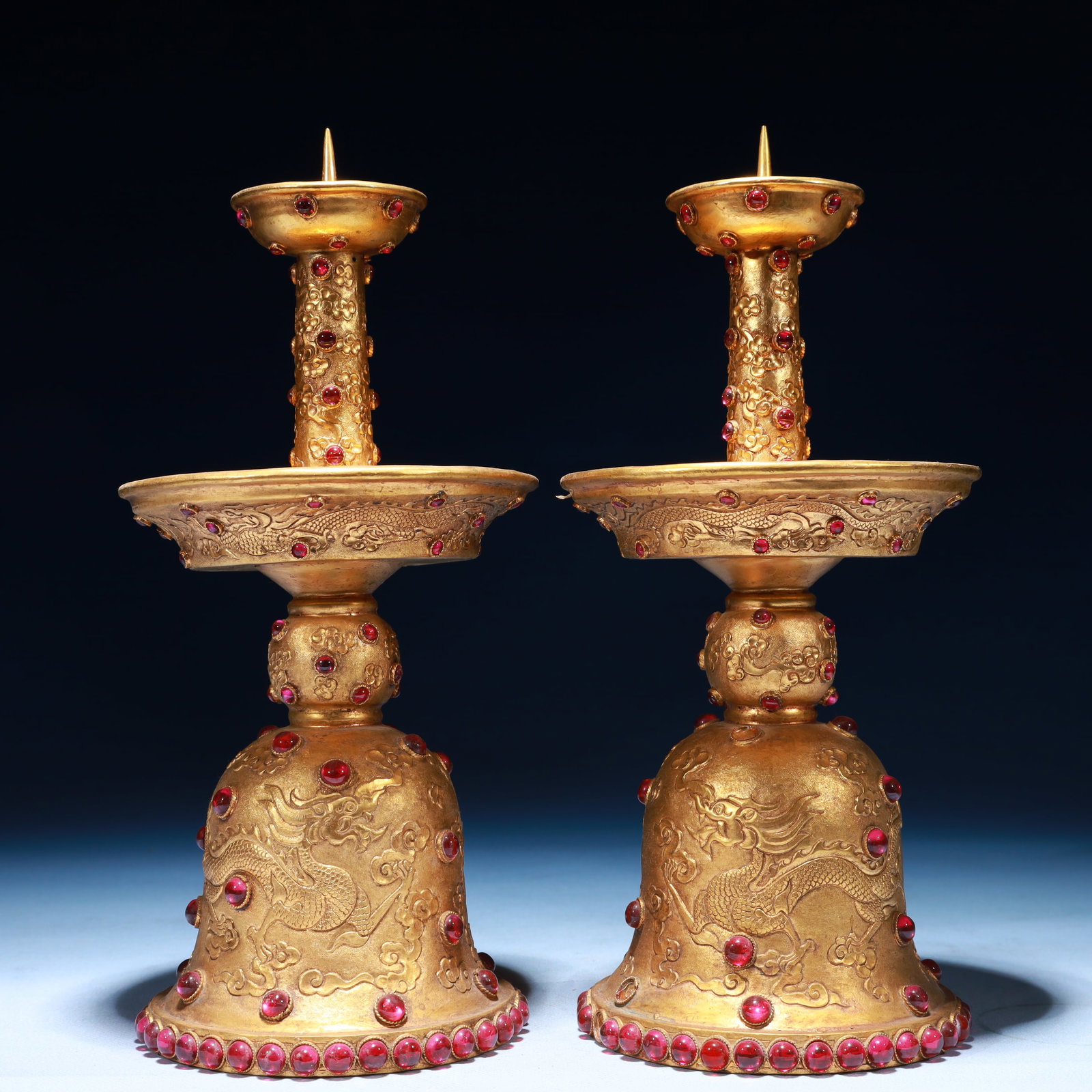 A Pair of Exquisite Gilt Bronze Dragon Pattern Candlestick,Inlaid Gems: A Pair of Exquisite Gilt Bronze Dragon Pattern Candlestick,Inlaid Gems,Qing Dynasty,China,Size:4.7inx10.6inx4.7in,Weight:1850g 一对铜鎏金龙纹烛台,