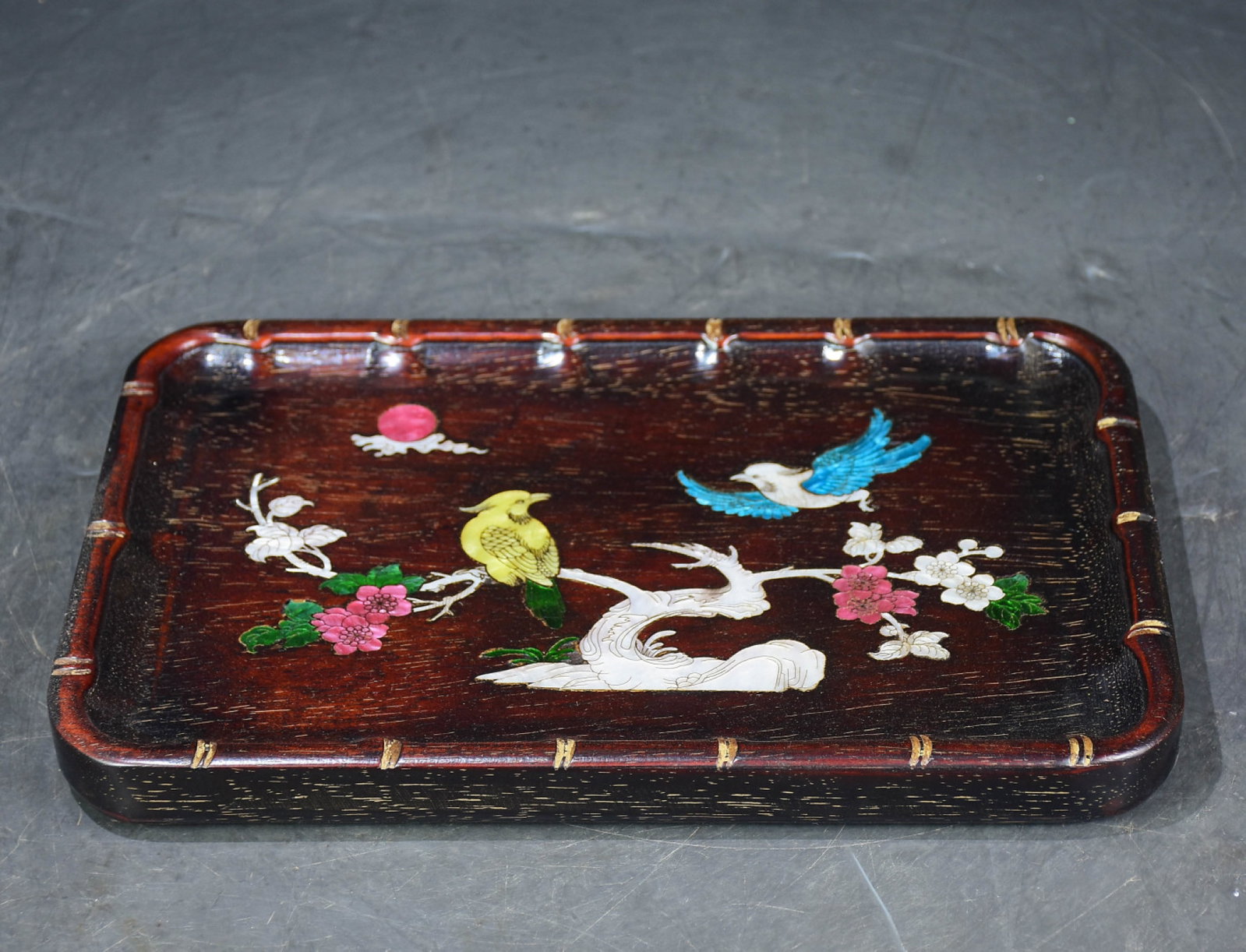 A Rare Zitanwood Inlaid Shell Flower and Bird Pattern Plate: A Rare Zitanwood Inlaid Shell Flower and Bird Pattern Plate,Qing Dynasty,China,Size:1.2inx11.6inx7.5in 紫檀木镶贝壳花鸟纹盘,中国