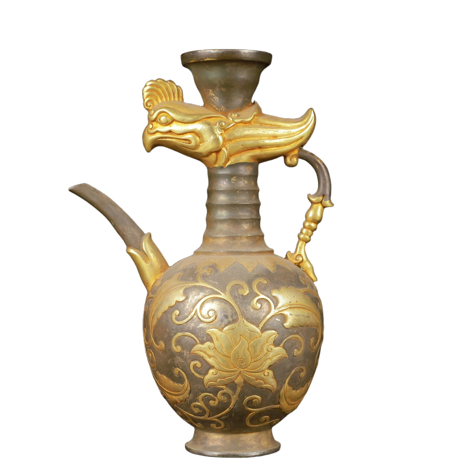 An Exquisite Gilt Silver Flower Pattern Ewer: An Exquisite Gilt Silver Flower Pattern Ewer,Tang Dynasty,China,Zhenguan Four-Character Mark,Size:5.5inx3.5inx8.3in,Weight:750g 银鎏金花卉纹执壶,中