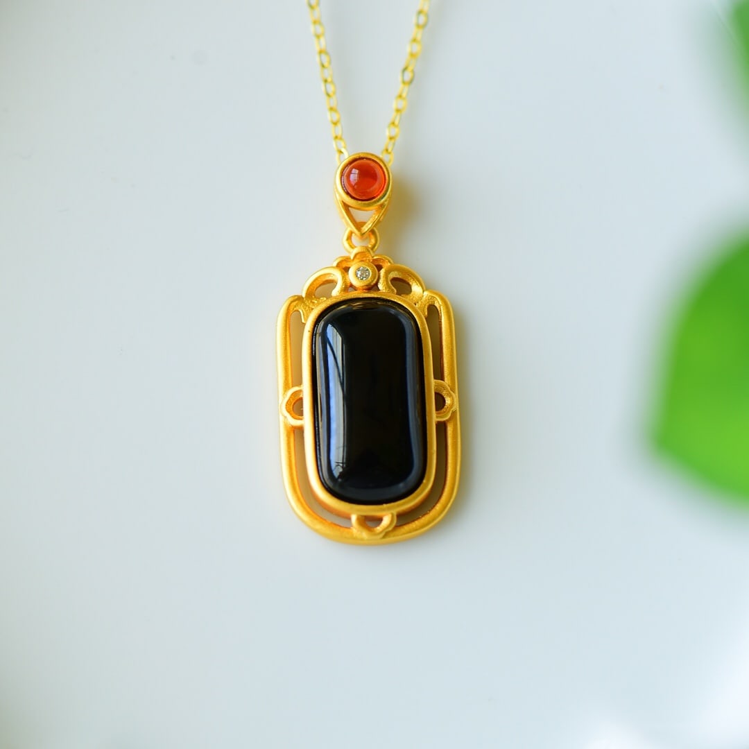 An Exquisite Sterling Silver-Gold Plated Inlaid Black Jade Necklace: An Exquisite Sterling Silver-Gold Plated Inlaid Black Jade Necklace,Size:0.5inx1.2in 纯银镀金镶墨玉项链