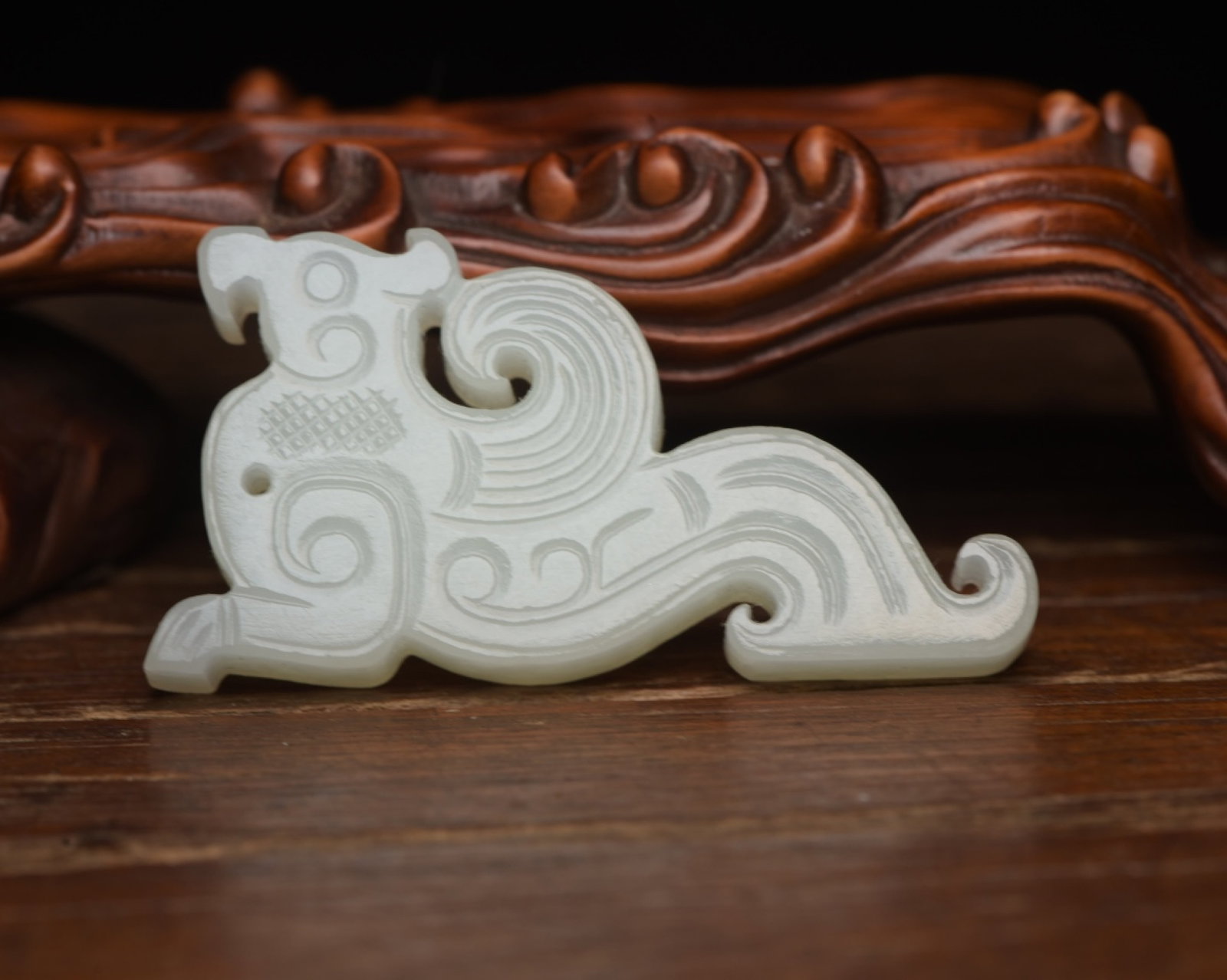 An Exquisite White Jade Phoenix Pattern Pendant: An Exquisite White Jade Phoenix Pattern Pendant,Qing Dynasty,China,Size:2.4inx1.3inx0.4in,Weight:31g 白玉凤纹佩,中国清代