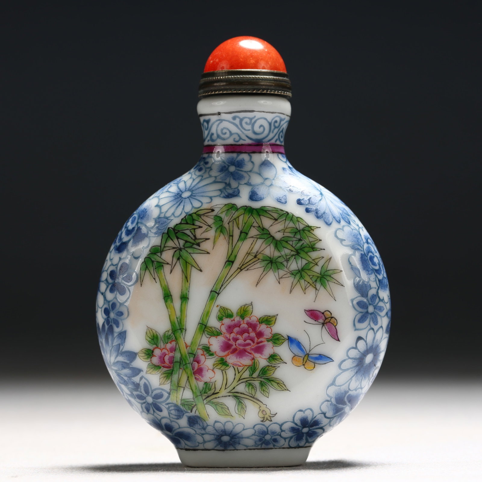 An Exquisite Enamel Flower and Butterfly Pattern Porcelain Snuff Bottle: An Exquisite Enamel Flower and Butterfly Pattern Porcelain Snuff Bottle,Qing Dynasty, China,Daoguang Mark,Size:2.2inx0.8inx3.1in