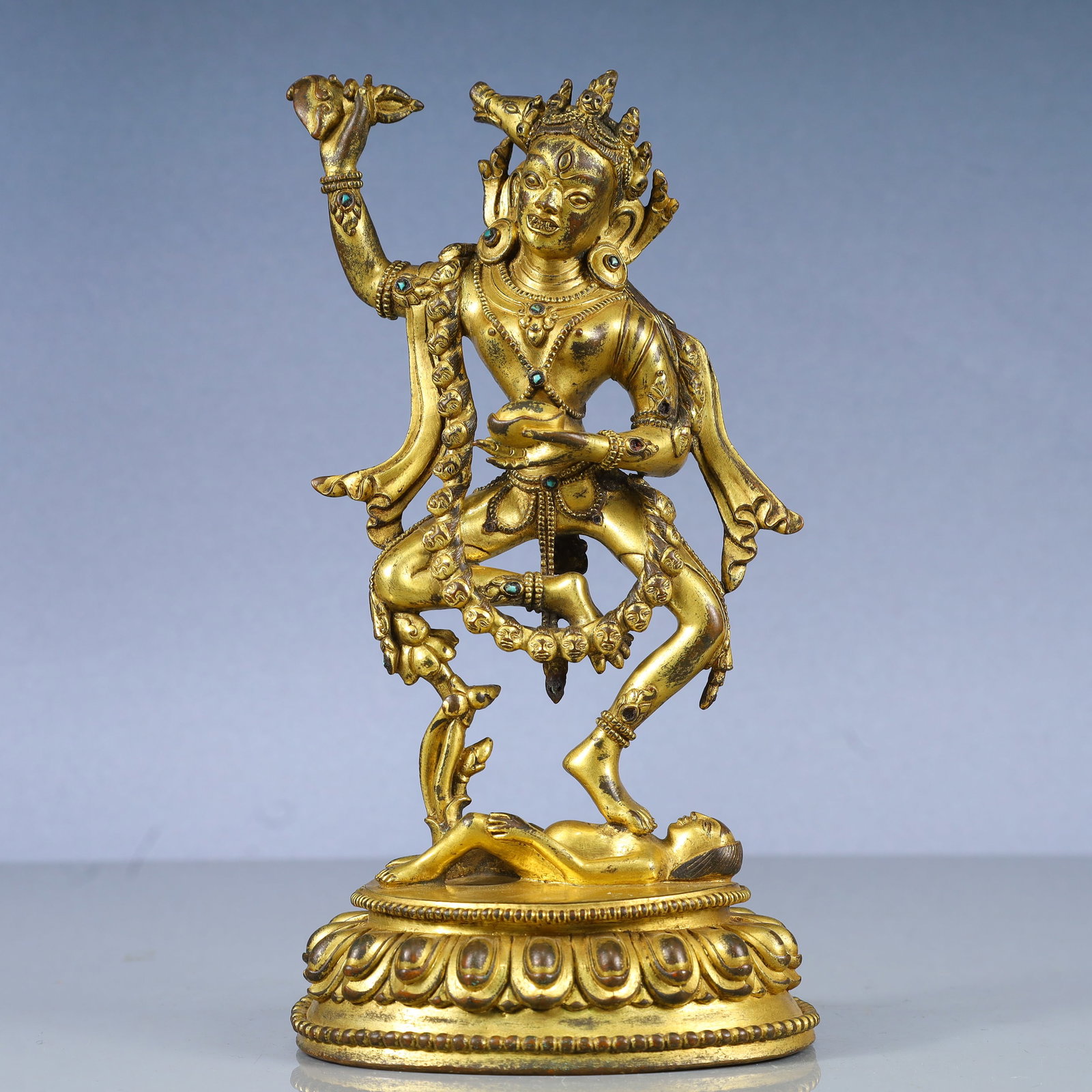 A Solemn Gilt Bronze Statue of Dakini,Inlaid Turquoise: A Solemn Gilt Bronze Statue of Dakini,Inlaid Turquoise,Qing Dynasty, China,Size:5.1inx4.3inx10.2in,Weight:2250g