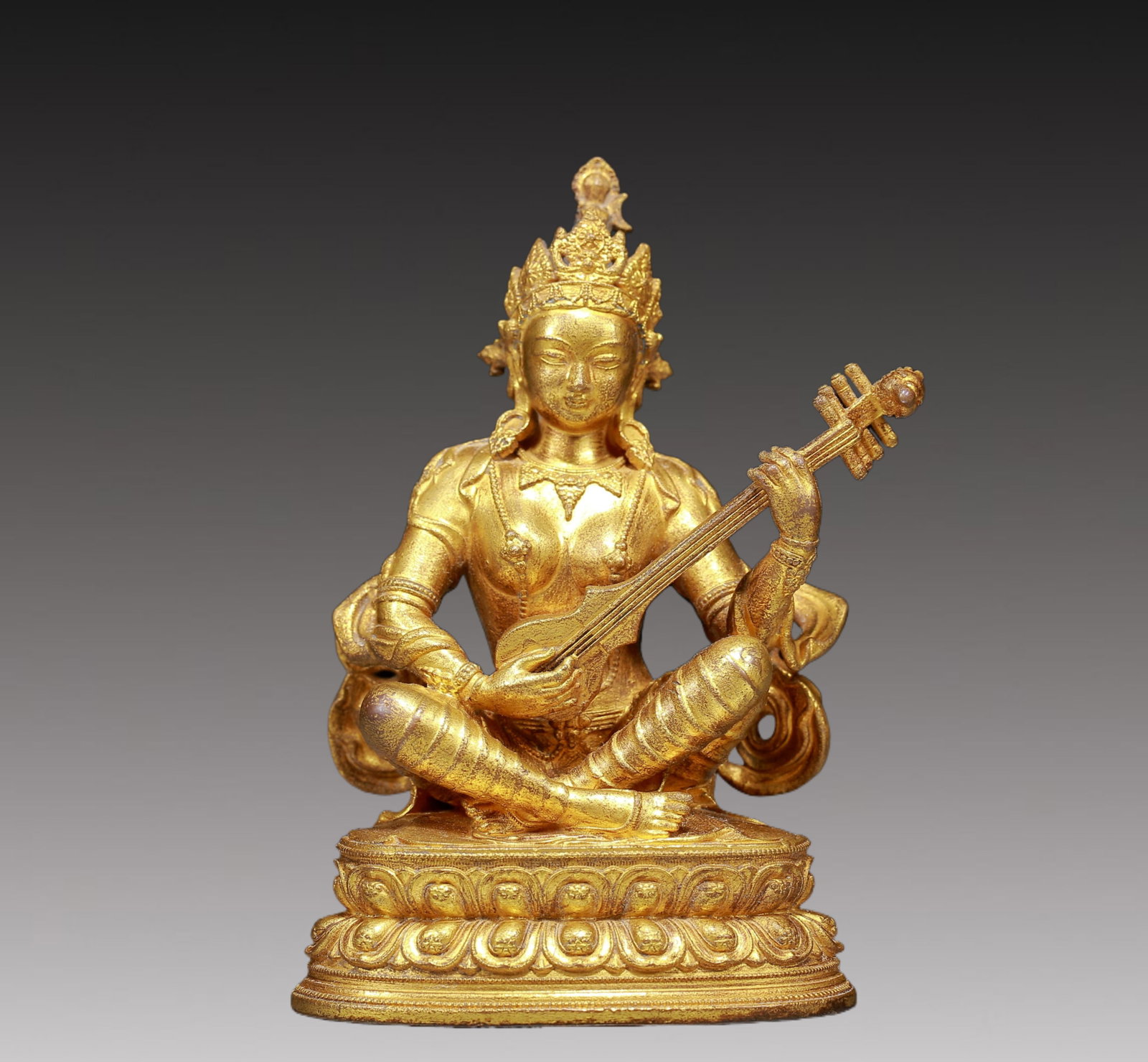 A Solemn Gilt Bronze Statue of Gadgadasvara: A Solemn Gilt Bronze Statue of Gadgadasvara,Ming Dynasty, China,Size:2.8inx2inx3.9in,Weight:340g 铜鎏金妙音观音像，明代