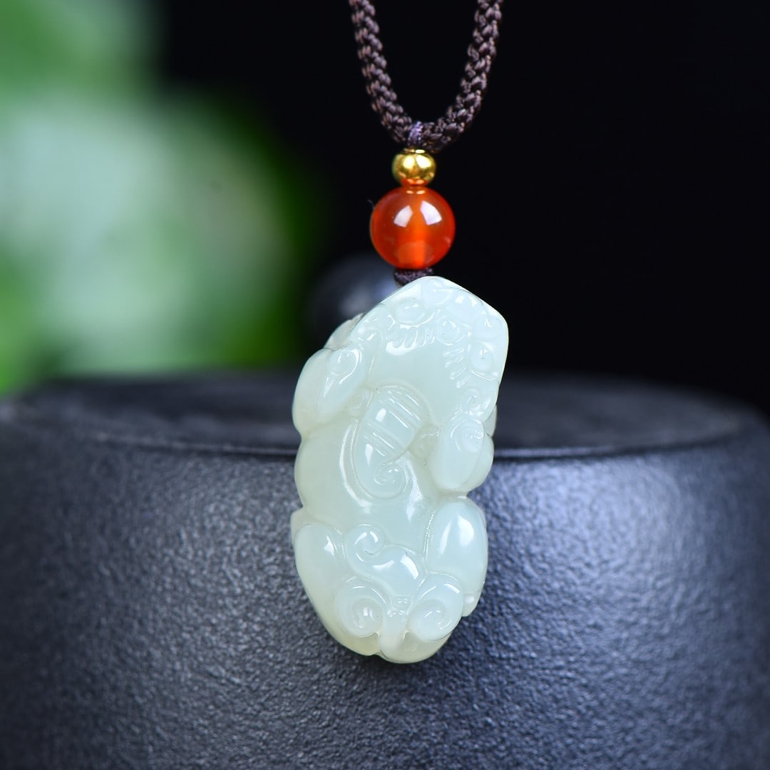 An Exquisite White Jade Wealth-Attracting Creature Pendant: An Exquisite White Jade Wealth-Attracting Creature Pendant,Size:0.5inx1.1in 白玉貔貅挂件