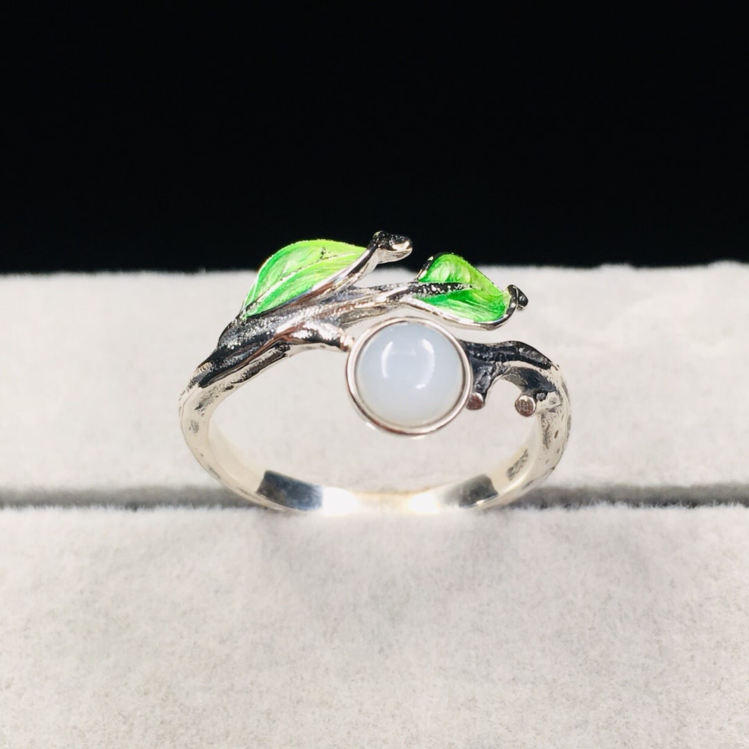 An Exquisite Sterling Silver Inlaid White Jade Enamel Ring: An Exquisite Sterling Silver Inlaid White Jade Enamel Ring 纯银镶白玉珐琅戒指
