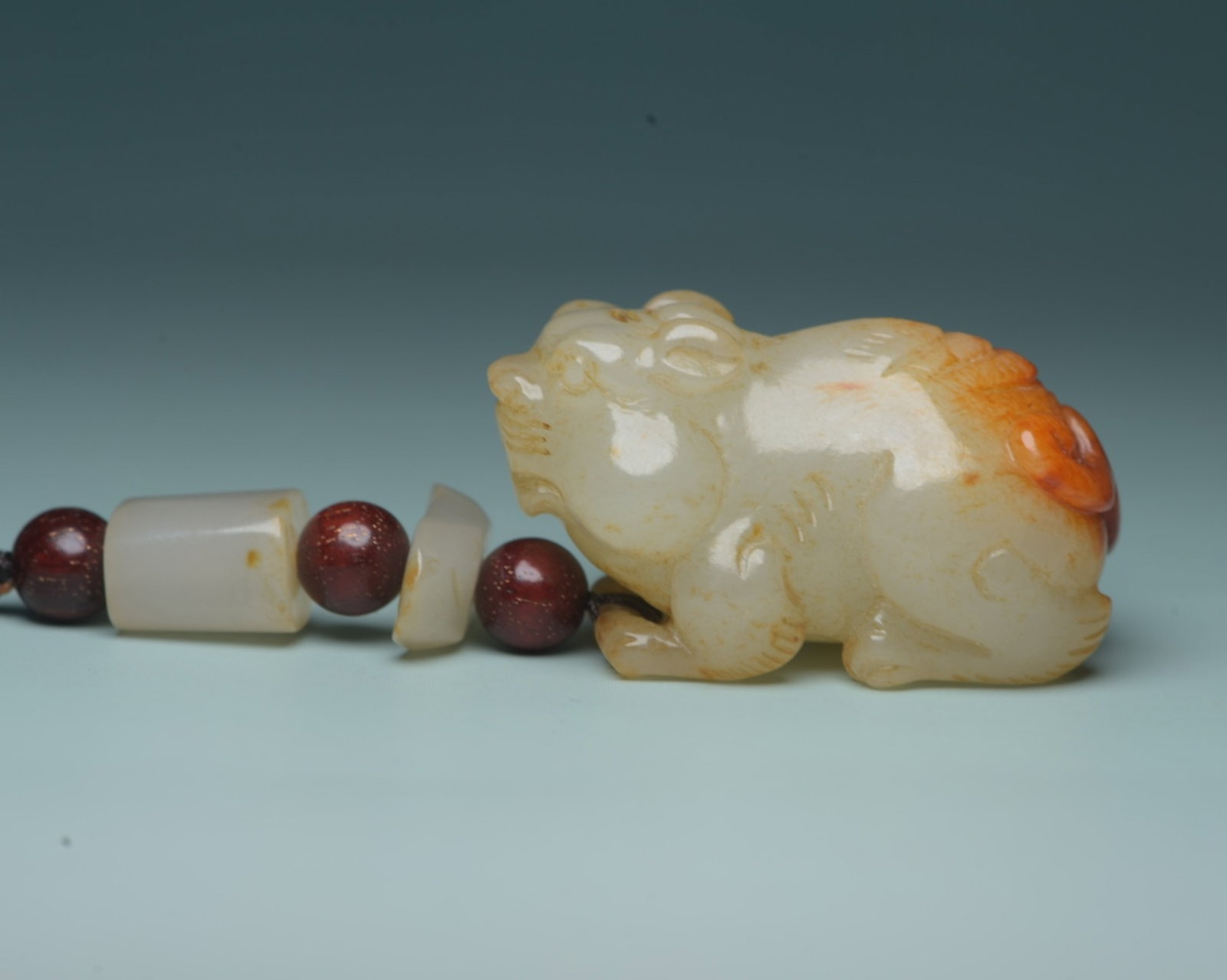 An Exquisite White Jade Beast Pendant: An Exquisite White Jade Beast Pendant,Qing Dynasty,China,Size:1.8inx1inx0.9in,Weight:46g 白玉兽挂件,中国清代