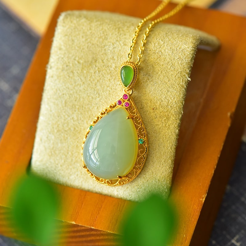 An Exquisite Sterling Silver-Gold Plated Inlaid Greenish Jade Necklace,Inlaid Gems: An Exquisite Sterling Silver-Gold Plated Inlaid Greenish Jade Necklace,Inlaid Gems,Size:0.6inx1.2in 纯银镀金镶青玉项链,嵌宝石