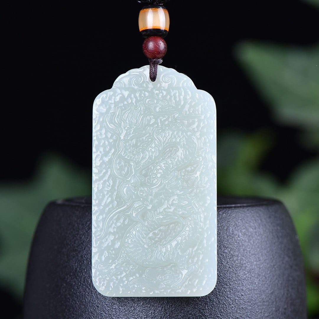 An Exquisite White Jade Dragon Pattern Pendant: An Exquisite White Jade Dragon Pattern Pendant,Size:1.2inx2.2in 白玉龙纹挂件