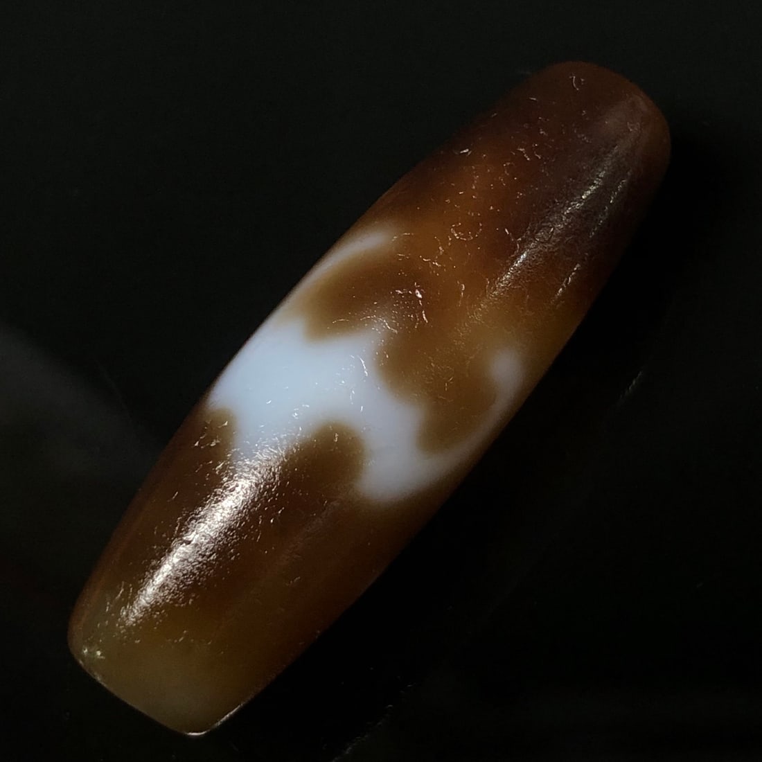 An Exquisite Dzi Bead Pendant: An Exquisite Dzi Bead Pendant,Size:1.5inx0.5in,Weight:9.1g 天珠挂件
