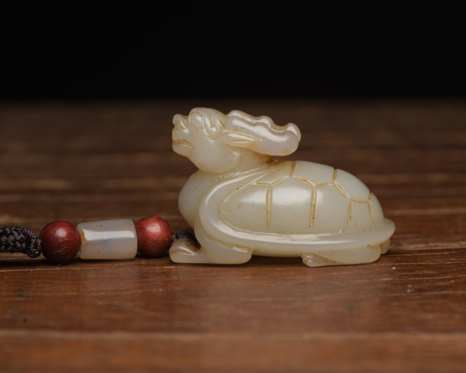 An Exquisite White Jade Dragon Turtle Ornament: An Exquisite White Jade Dragon Turtle Ornament,Qing Dynasty,China,Size:1.8inx1.1inx0.9in,Weight:40g 白玉龙龟摆件,中国清代