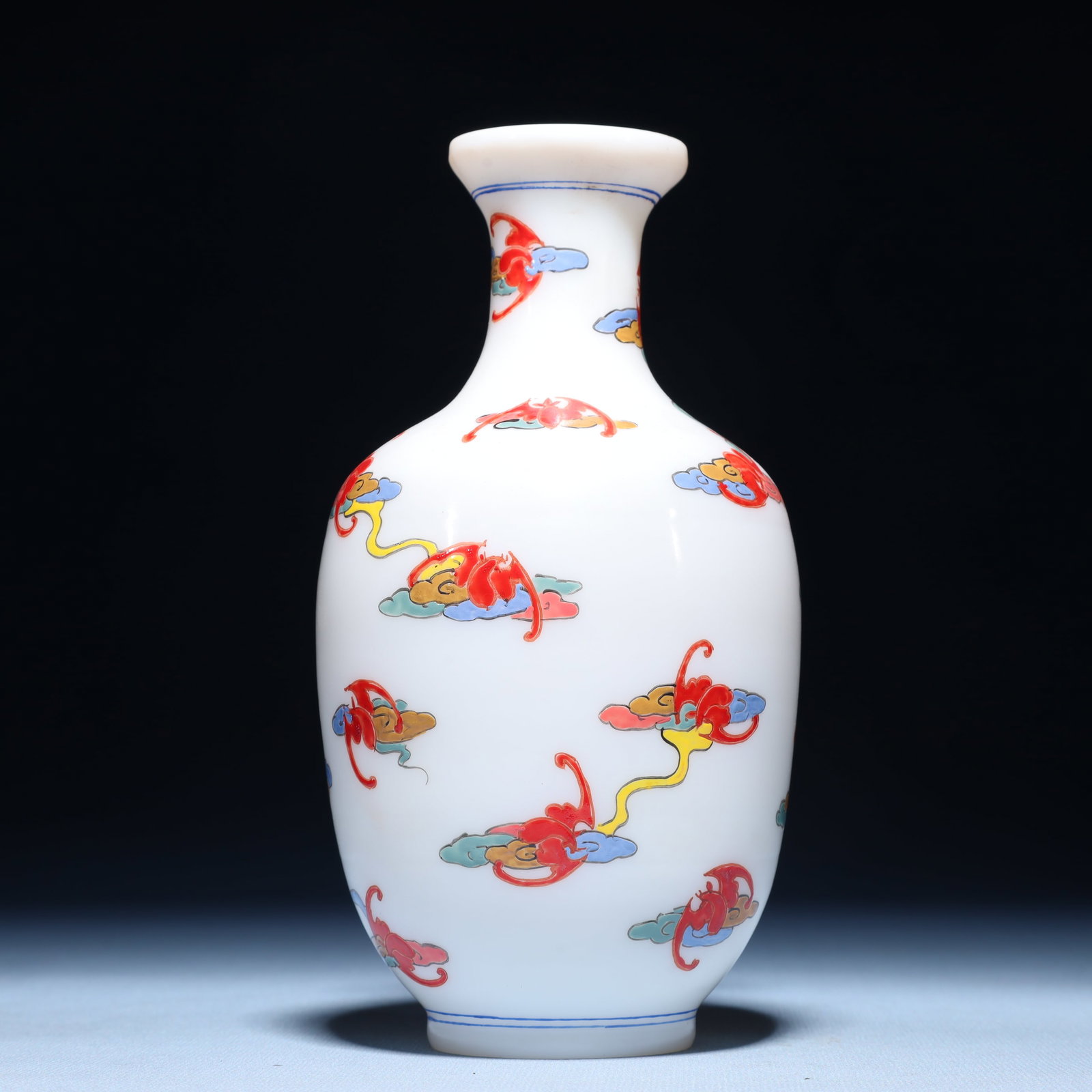 An Exquisite Glass Auspicious Cloud and Bats Pattern Vase: An Exquisite Glass Auspicious Cloud and Bats Pattern Vase,Qing Dynasty,China,Qianlong Four-character Mark,Size:3.5inx7.1in,Weight:441g 琉璃祥云蝙蝠纹瓶,