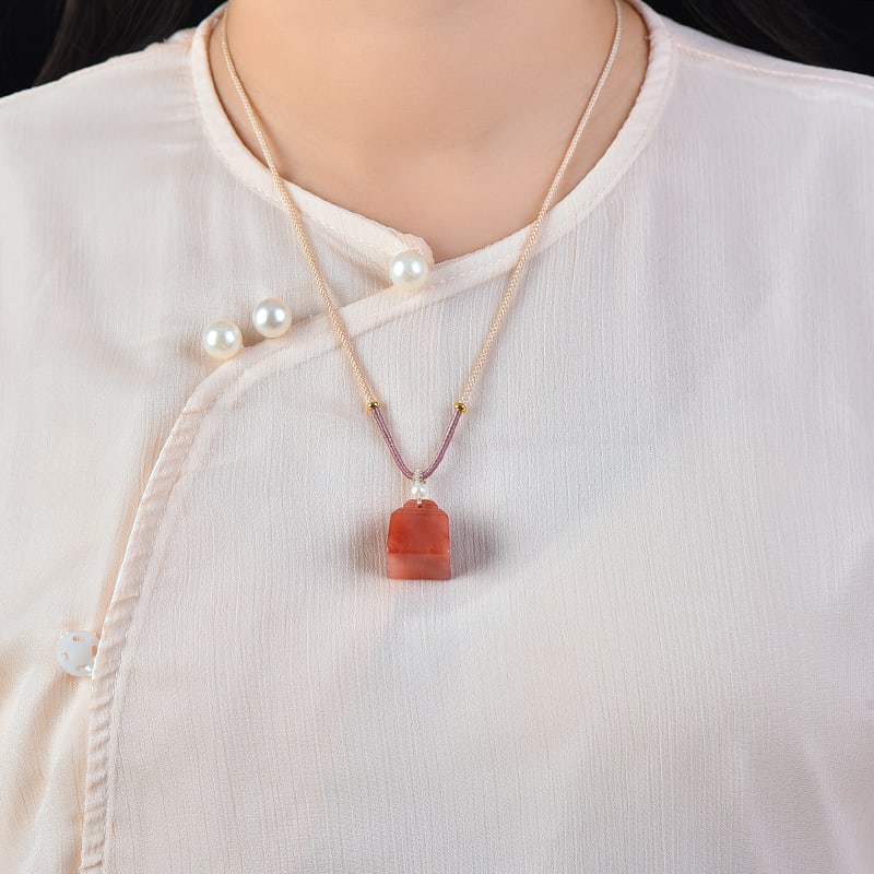 An Exquisite Red Jade Pendant: An Exquisite Red Jade Pendant,Size:0.7inx0.8in 红玉挂件
