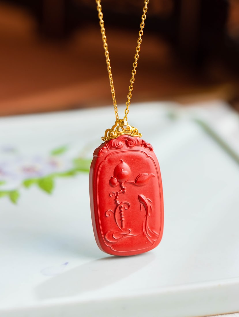 An Exquisite Sterling Silver-Gold Plated Inlaid Cinnabar Pendant: An Exquisite Sterling Silver-Gold Plated Inlaid Cinnabar Pendant 纯银镀金镶朱砂吊坠