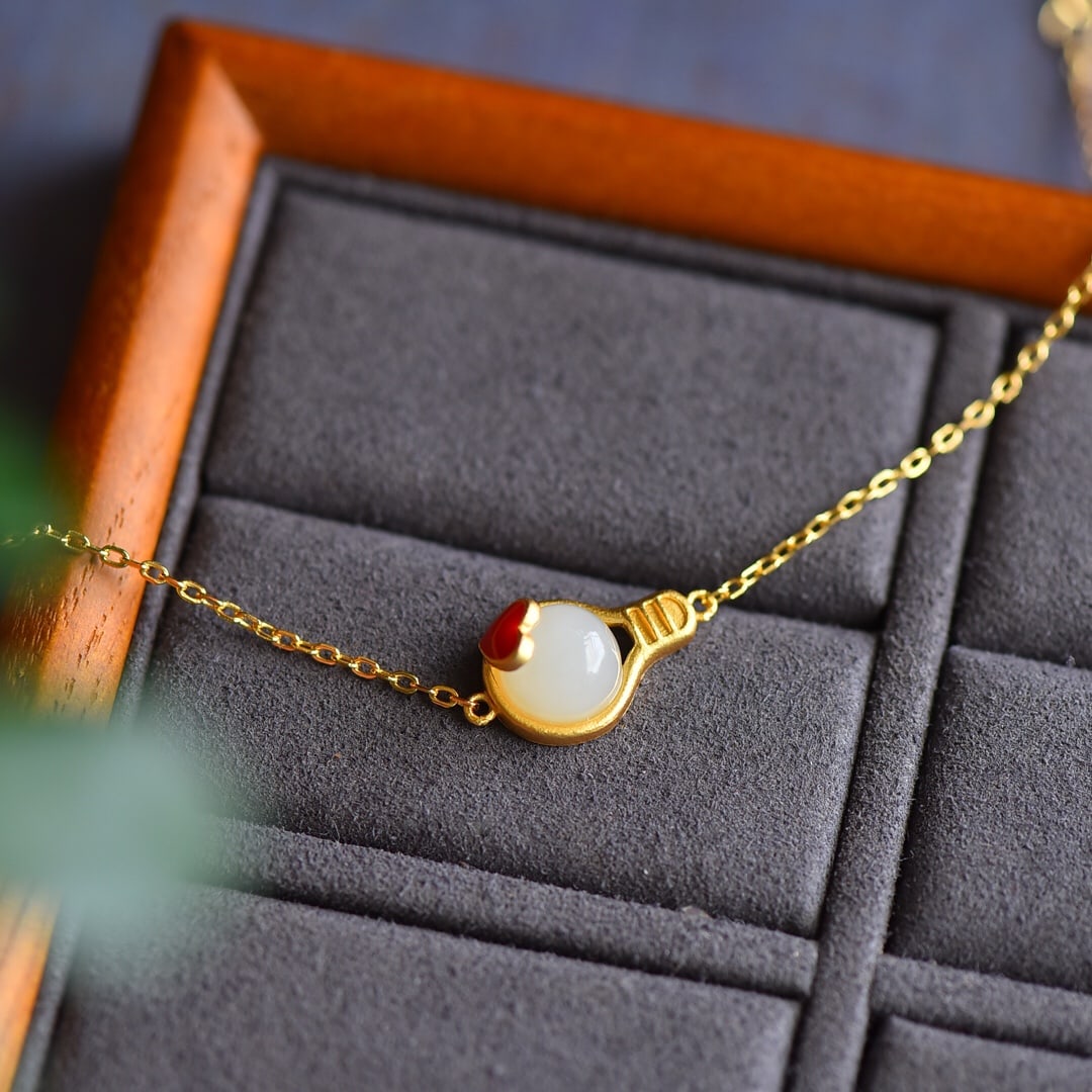 An Exquisite Sterling Silver-Gold Plated Inlaid White Jade Enamel Bracelet: An Exquisite Sterling Silver-Gold Plated Inlaid White Jade Enamel Bracelet,Size:0.3inx0.3in 纯银镀金镶白玉珐琅手链
