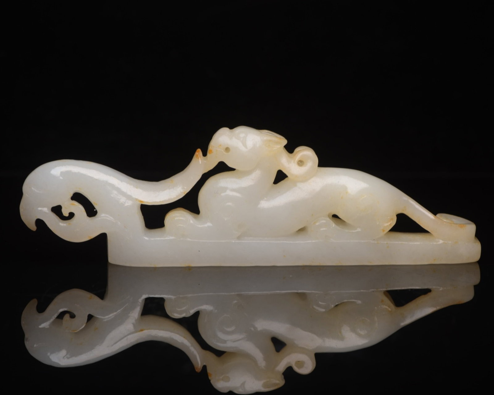 An Exquisite White Jade Dragon and Phoenix Ornament: An Exquisite White Jade Dragon and Phoenix Ornament,Qing Dynasty,China,Size:5.1inx1.5inx0.6in,Weight:97g 白玉龙凤摆件,中国清代
