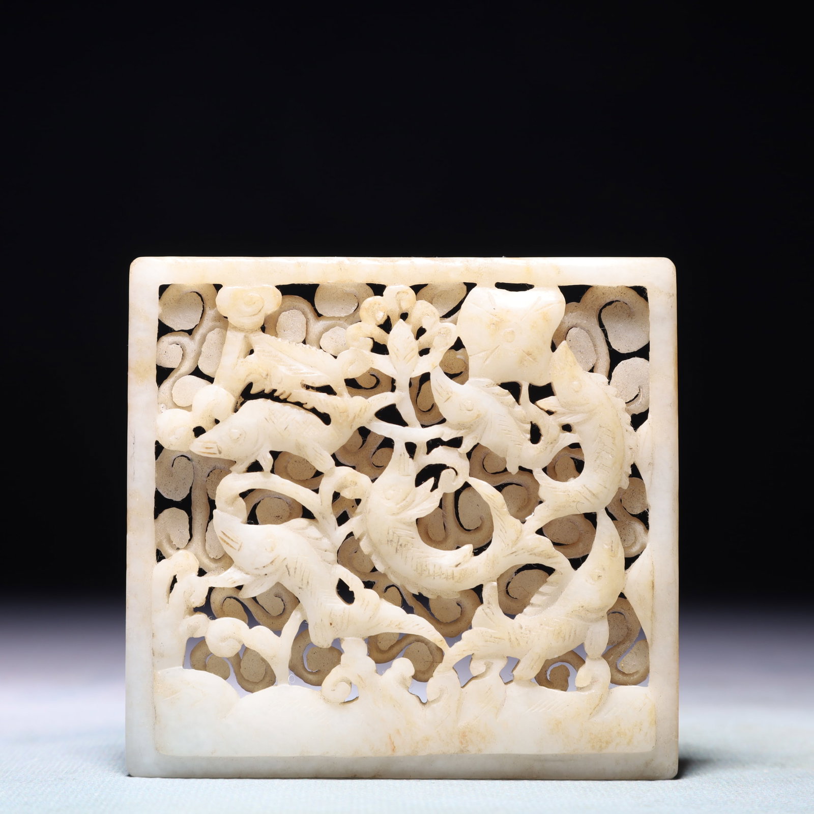 An Exquisite White Jade Fish Pattern Pendant: An Exquisite White Jade Fish Pattern Pendant,Qing Dynasty,China,Size:3.3inx3.2in,Weight:109.3g 白玉鱼纹佩,中国清代