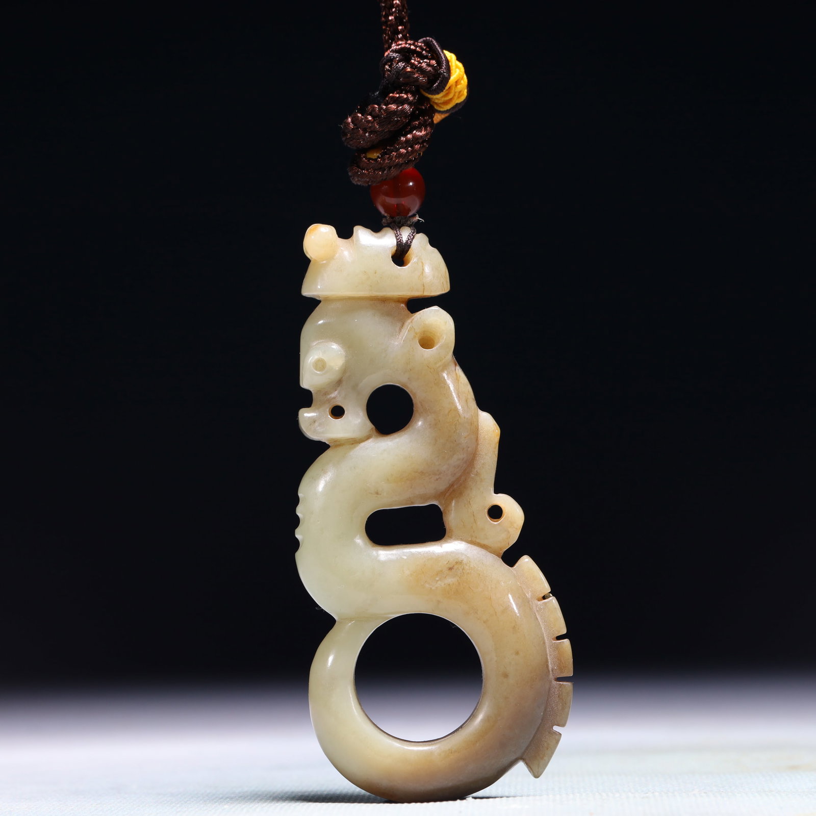 An Exquisite White Jade Pig and Dragon Pendant: An Exquisite White Jade Pig and Dragon Pendant,Qing Dynasty,China,Size:1.6inx0.4inx3.9in,Weight:91g 白玉猪龙挂件,中国清代