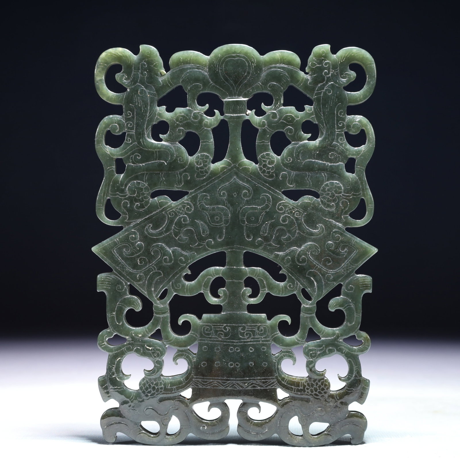 An Exquisite Jasper Beast-Face Pattern Pendant: An Exquisite Jasper Beast-Face Pattern Pendant,Qing Dynasty,China,Size:4.5inx10.2in,Weight:223g 碧玉兽面纹挂件,中国清代