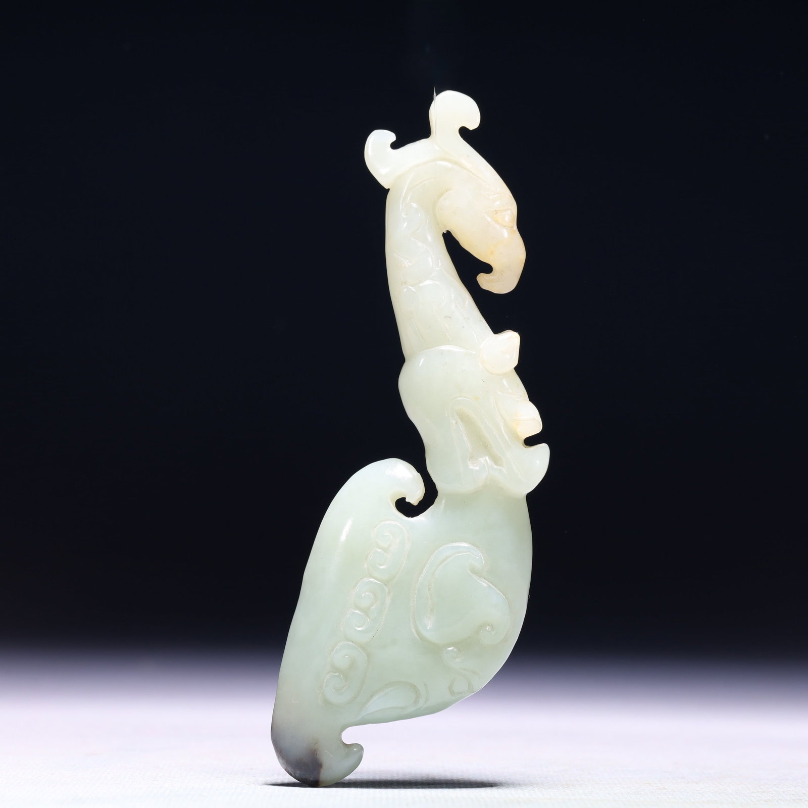 An Exquisite White Jade Phoenix Ornament: An Exquisite White Jade Phoenix Ornament,Qing Dynasty,China,Size:1.6inx0.4inx4.9in,Weight:107g 白玉凤摆件,中国清代