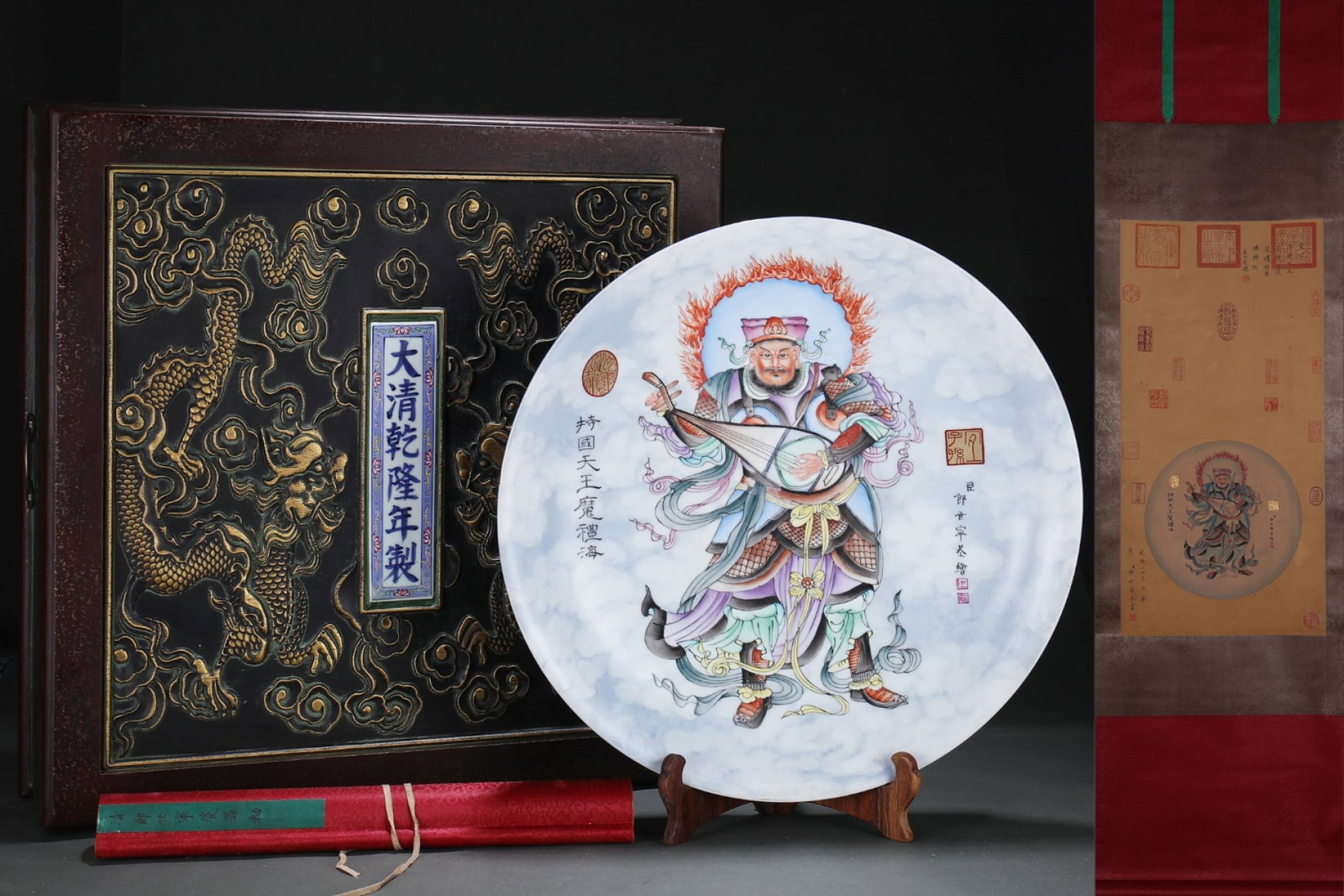 A Huge Ji Blue Glazed Famille-Rose Figure Pattern Plate,with Chinese Vertical Scroll Ink Painting on: A Huge Ji Blue Glazed Famille-Rose Figure Pattern Plate,with Chinese Vertical Scroll Ink Painting on Silk,Qing Dynasty,China,Qianlong Six-character Mark,Size:(Without