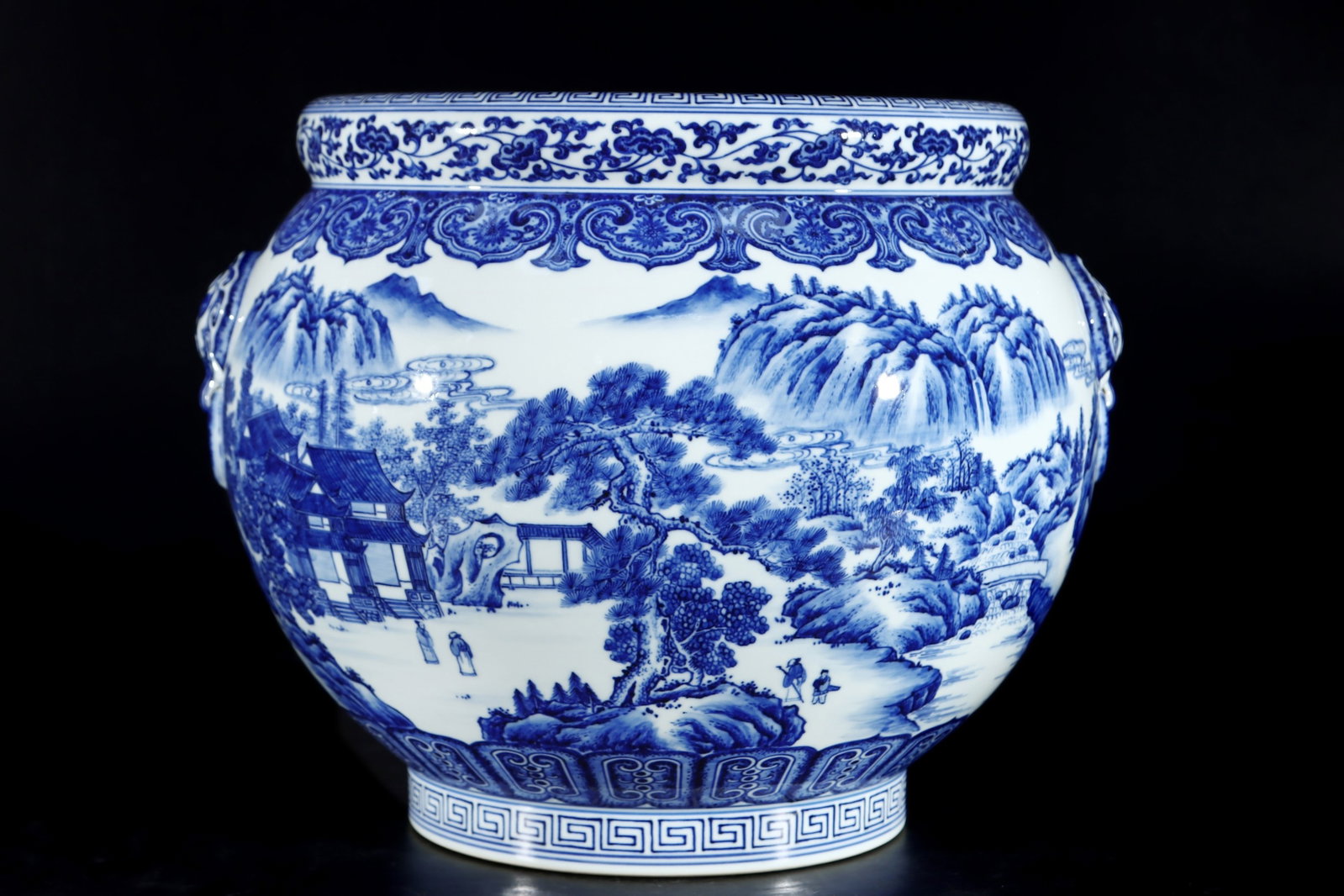 An Exquisite Blue and White Landscape and Figure Pattern Beast-Ears Vat: An Exquisite Blue and White Landscape and Figure Pattern Beast-Ears Vat,Qing Dynasty,China,Qianlong Six-character Mark,Size:11.8inx15in 青花山水人物纹兽