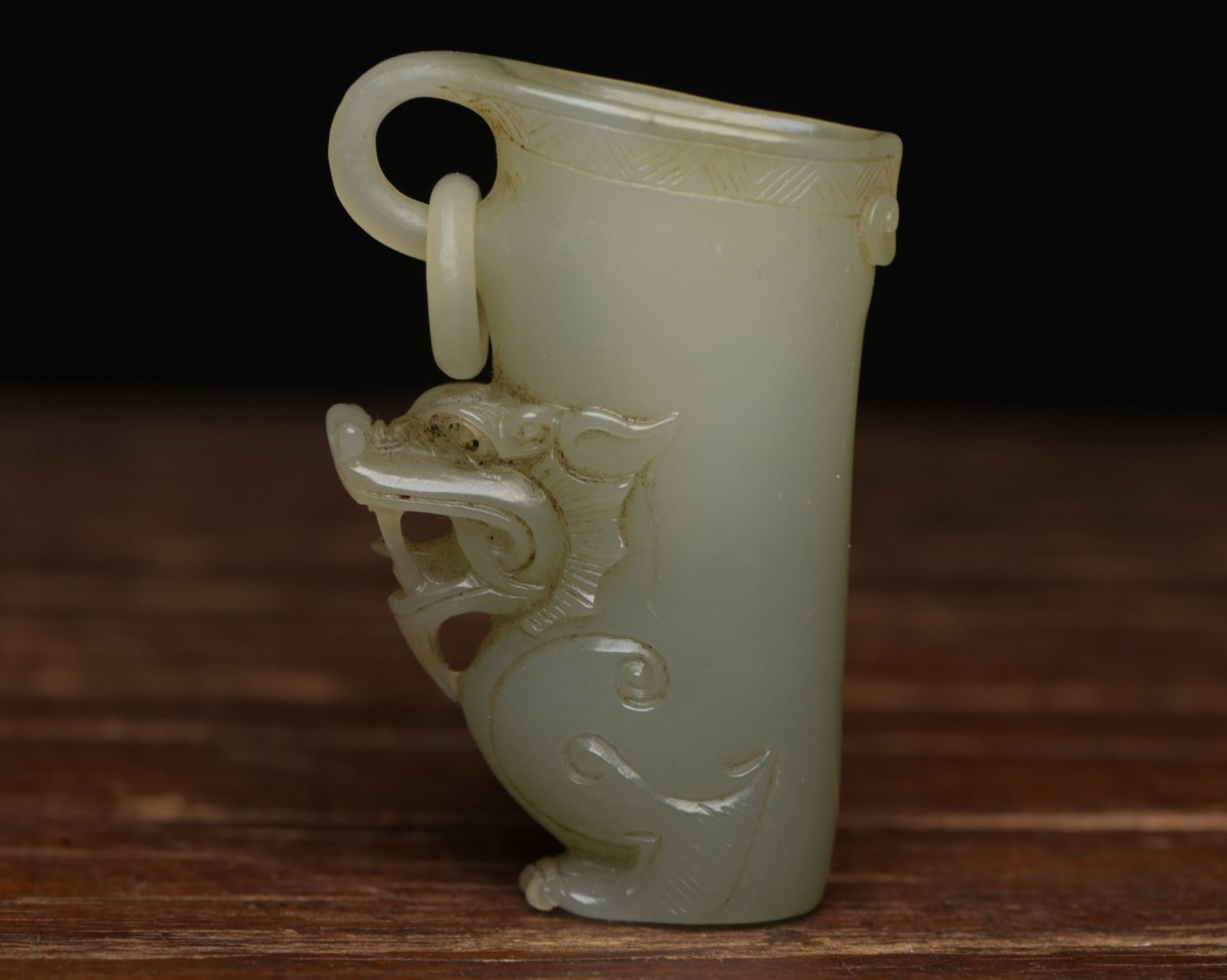 An Exquisite White Jade Dragon Pattern Cup: An Exquisite White Jade Dragon Pattern Cup,Qing Dynasty,China,Size:2.3inx1.5inx0.6in,Weight:40g 白玉龙纹杯子,中国清代