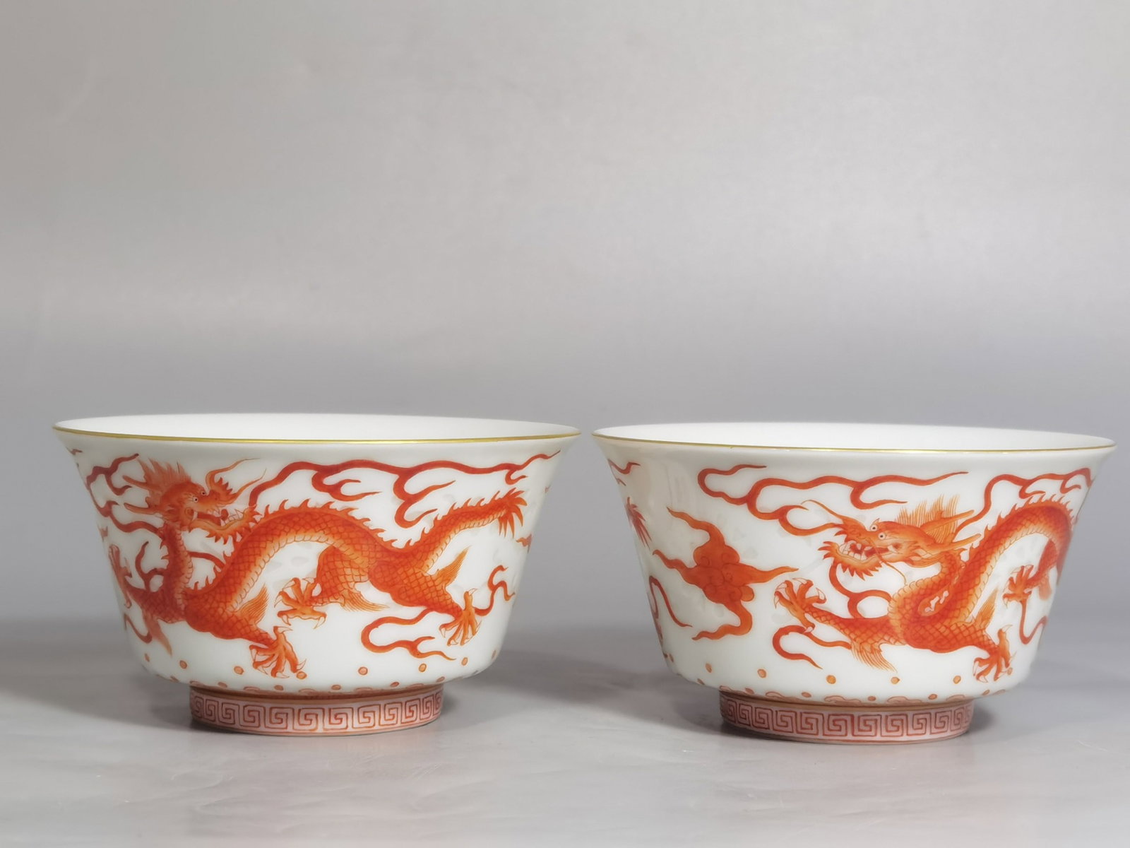 A Pair of Exquisite Iron-Red Auspicious Cloud and Dragon Pattern Cups: A Pair of Exquisite Iron-Red Auspicious Cloud and Dragon Pattern Cups,Qing Dynasty,China,Qianlong Six-character Mark,Size:3.3inx1.8in 一对矾红祥云龙纹&#