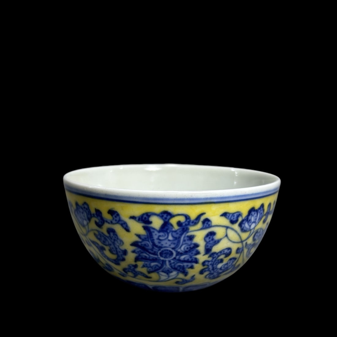 An Exquisite Yellow Ground Blue and White Lotus Pattern Cup: An Exquisite Yellow Ground Blue and White Lotus Pattern Cup,Qing Dynasty,China,Yongzheng Six-character Mark,Size:3.1inx1.6in